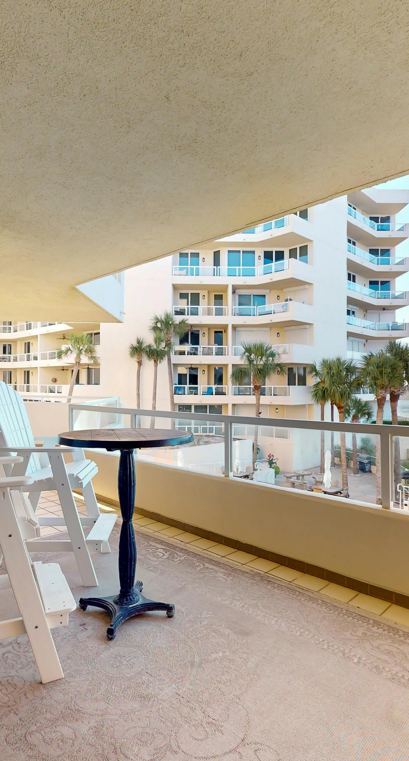 Ocean-view 2nd-floor condo with outdoor pool, gym, hot tub, balcony, W/D, AC