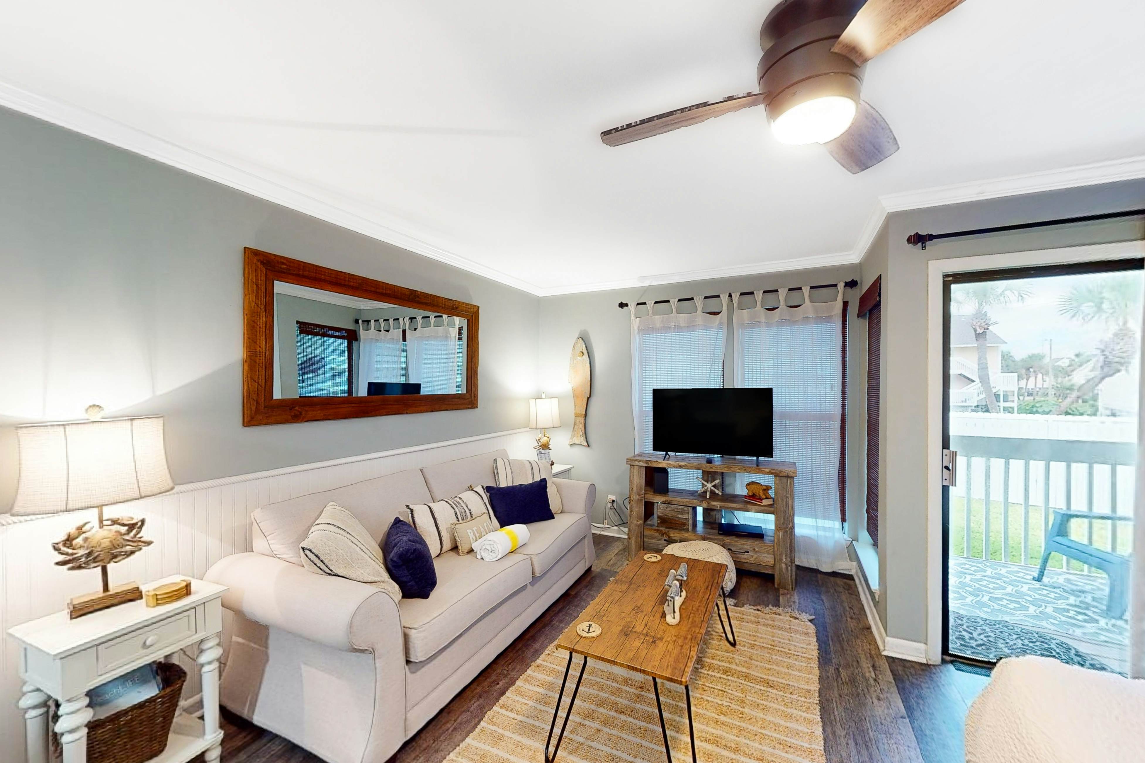 Dog-friendly charming beach condo with pool, hot tub, sauna, deck & water access