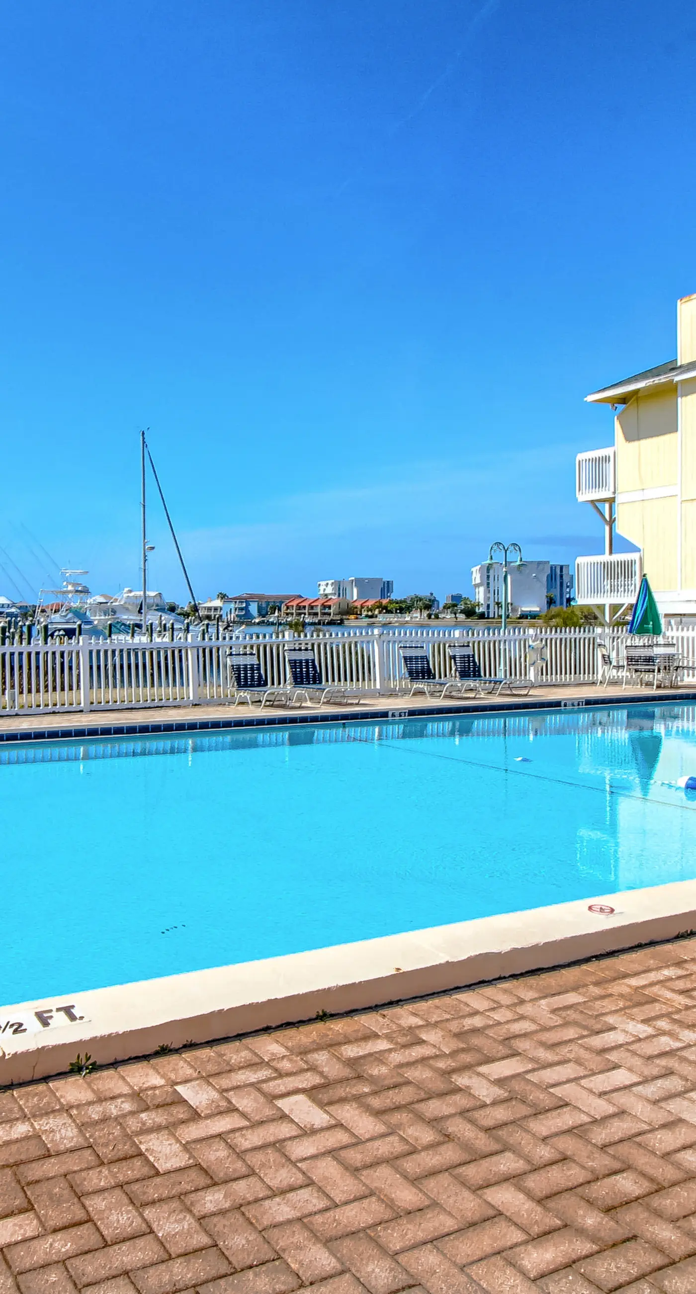 Dog-friendly charming beach condo with pool, hot tub, sauna, deck & water access