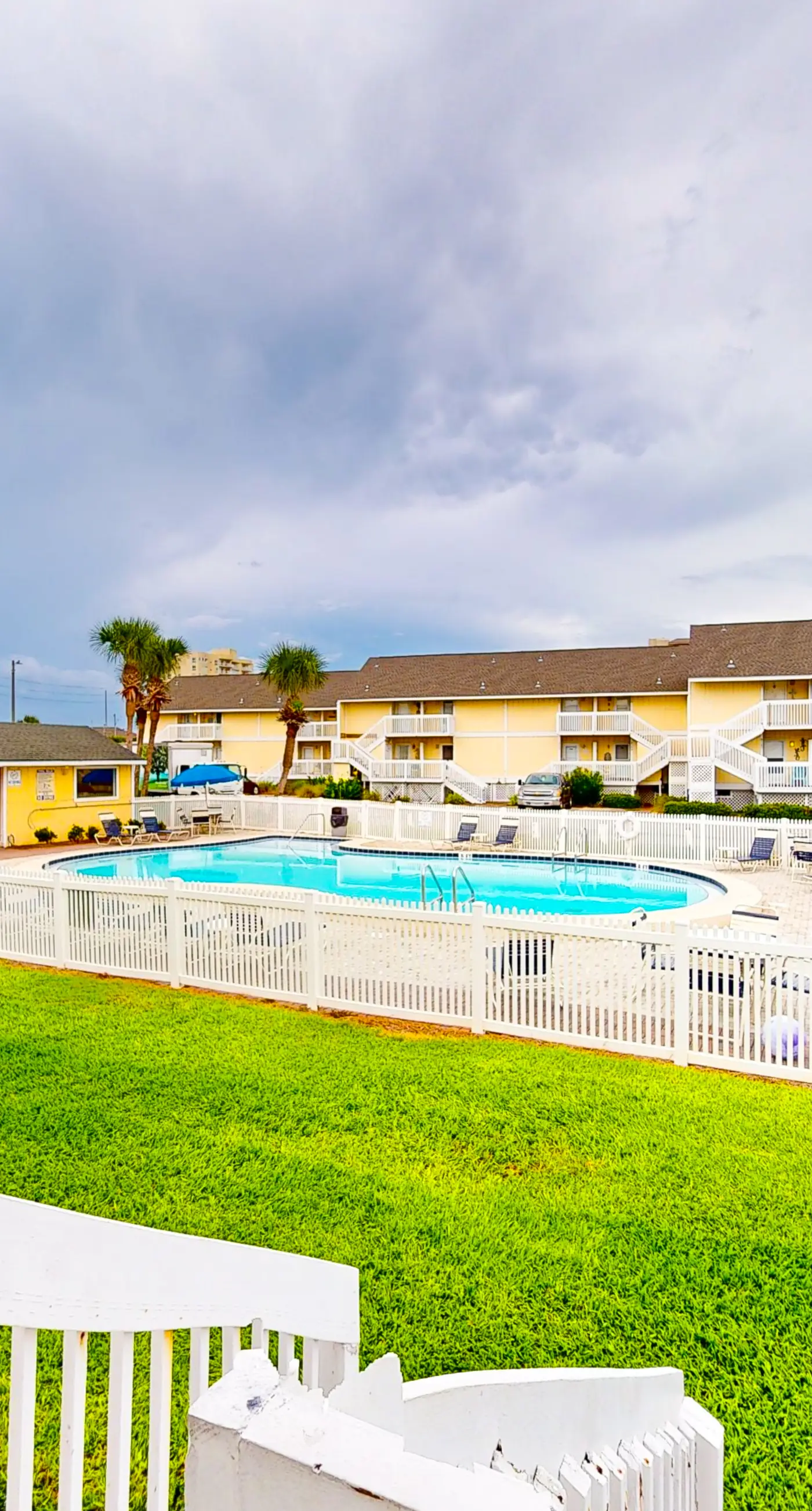 Dog-friendly charming beach condo with pool, hot tub, sauna, deck & water access