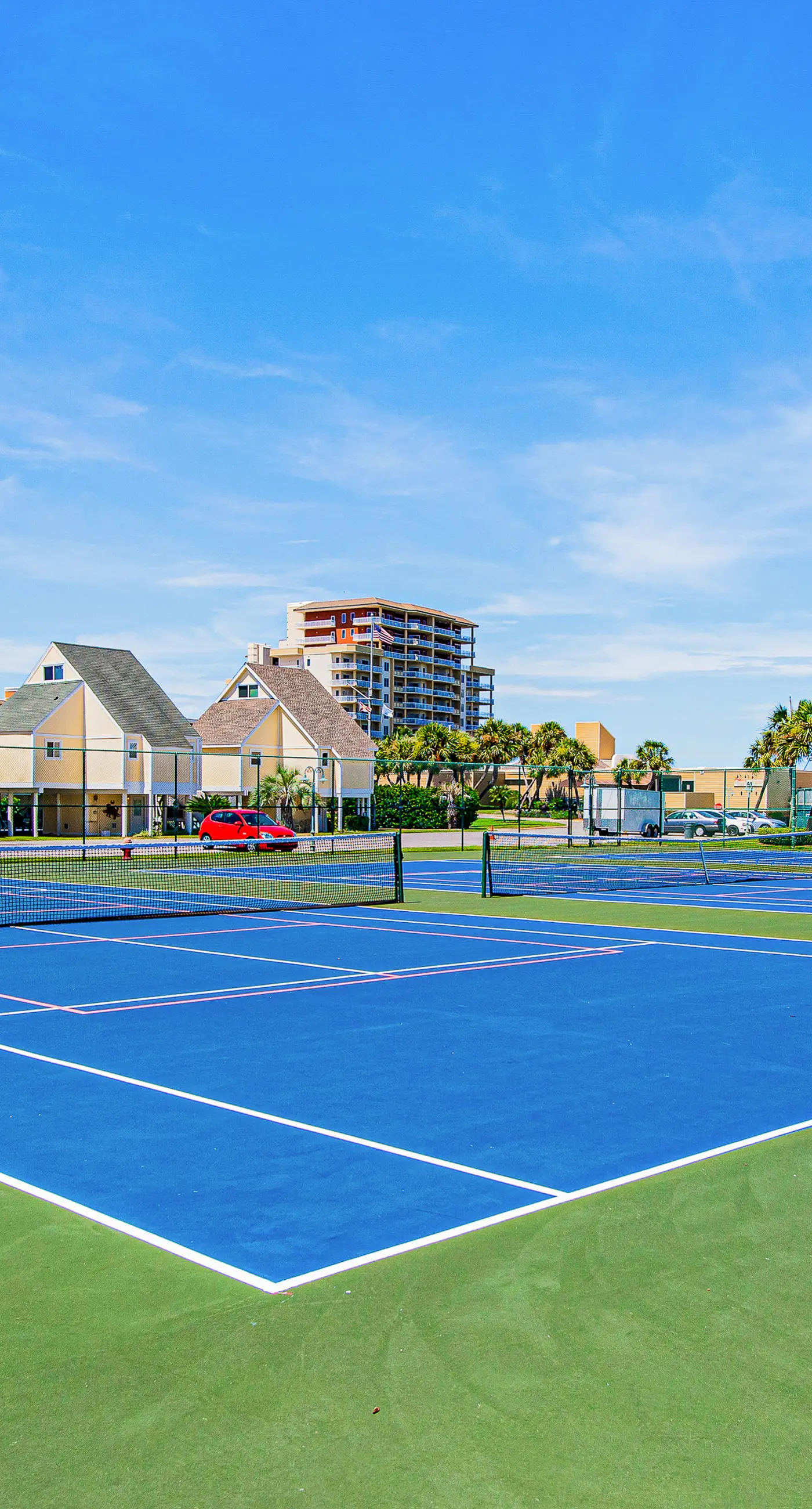 Dog-friendly charming beach condo with pool, hot tub, sauna, deck & water access