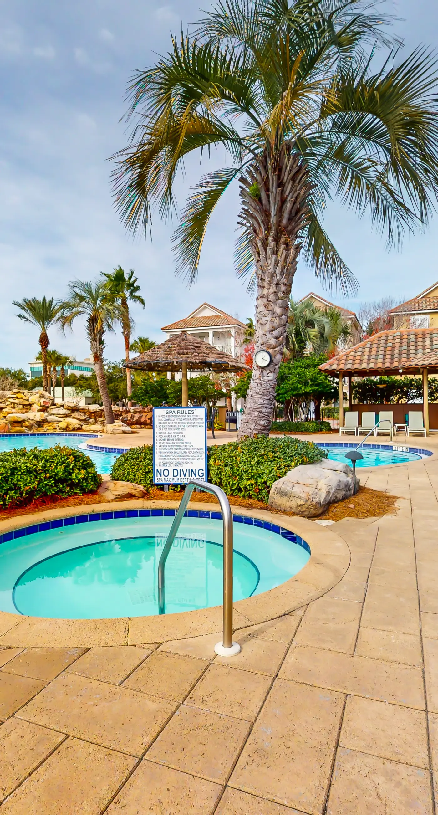 Snowbird-friendly home in gated community with hot tub, pool, balcony, & grill