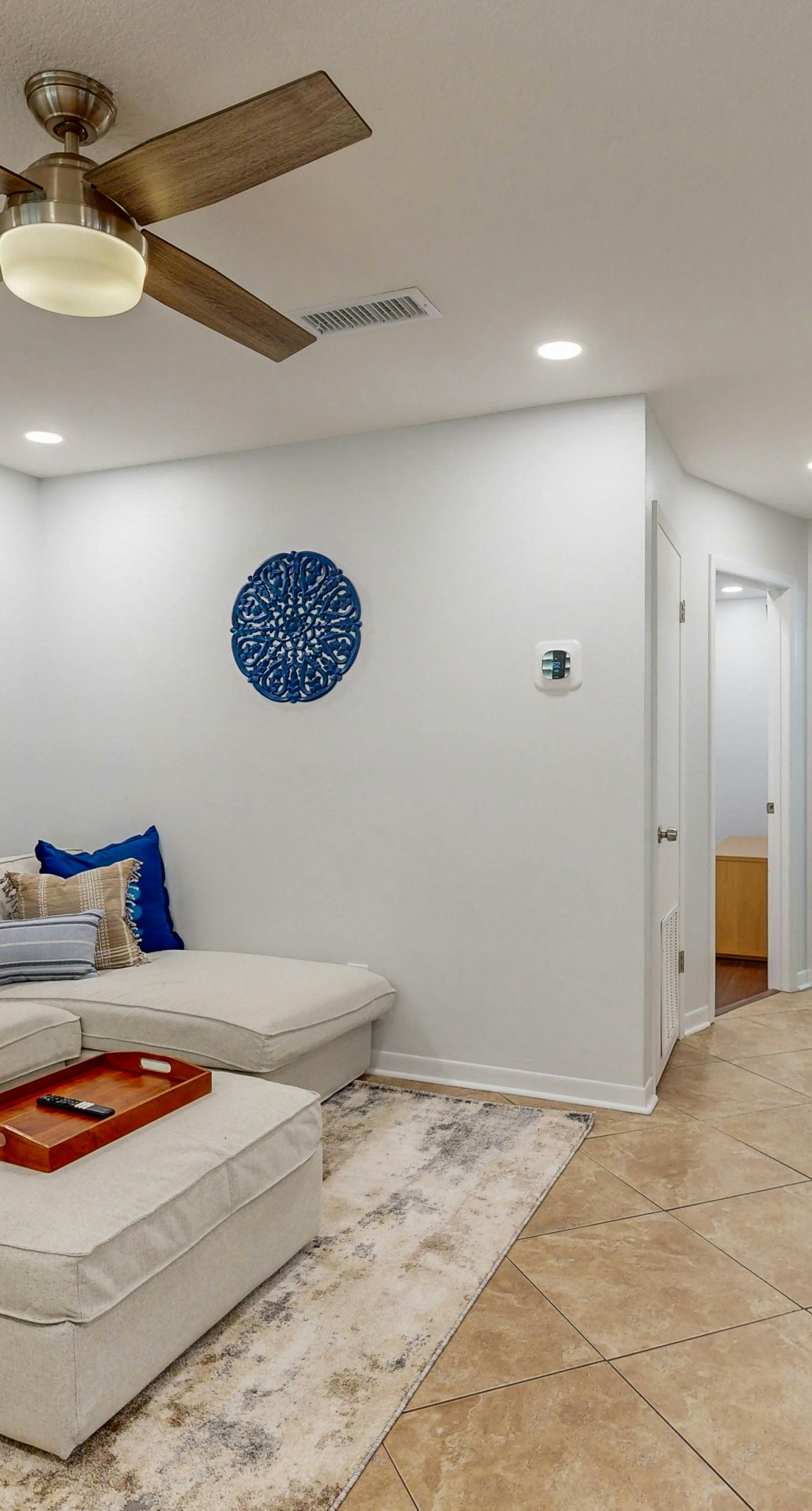 Coastal condo in a great location with balcony, open interior, washer/dryer & AC