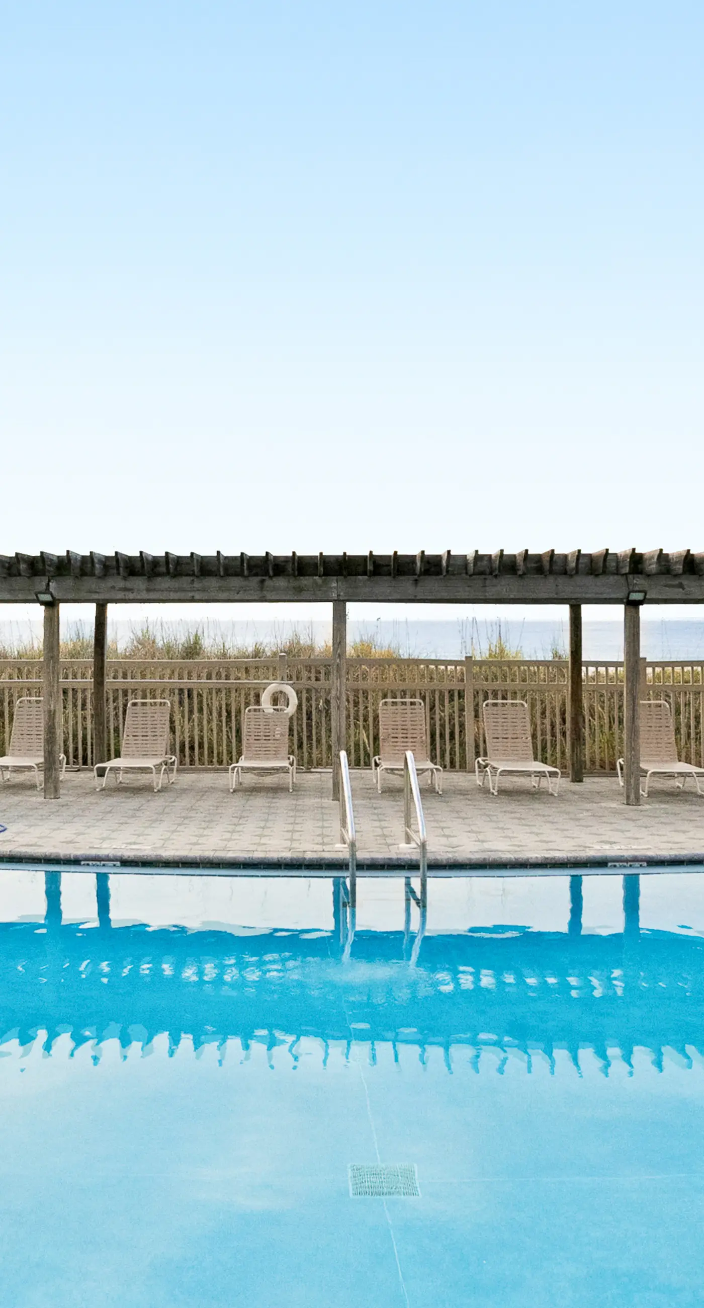 Snowbird-friendly condo with Gulf view, on-site pool, beach access, & gym