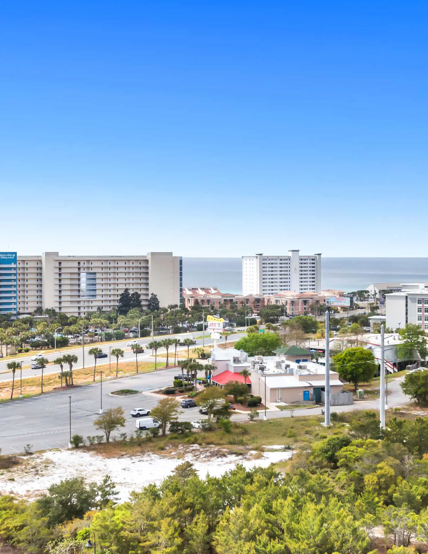 Gorgeous coastal condo with shared pool and private balcony