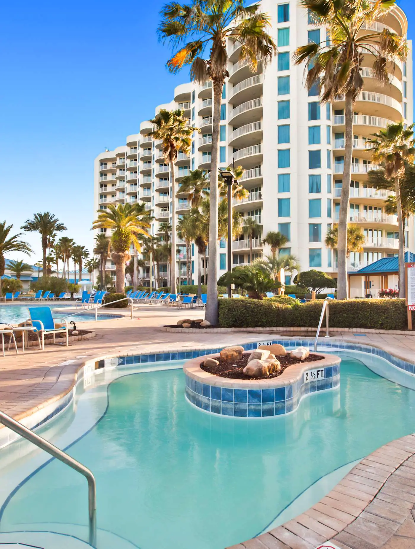 Gorgeous coastal condo with shared pool and private balcony