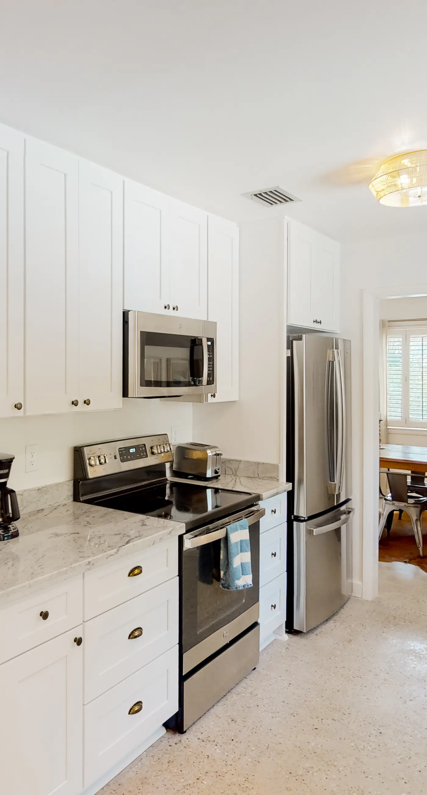 Dog-friendly home with pool, patio, full kitchen, & W/D - in a great location