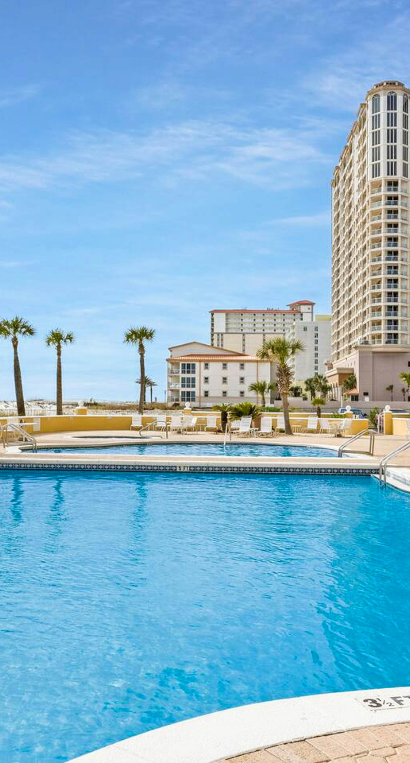 11th floor oceanfront condo with pool, hot tub, ocean view, W/D, and central AC