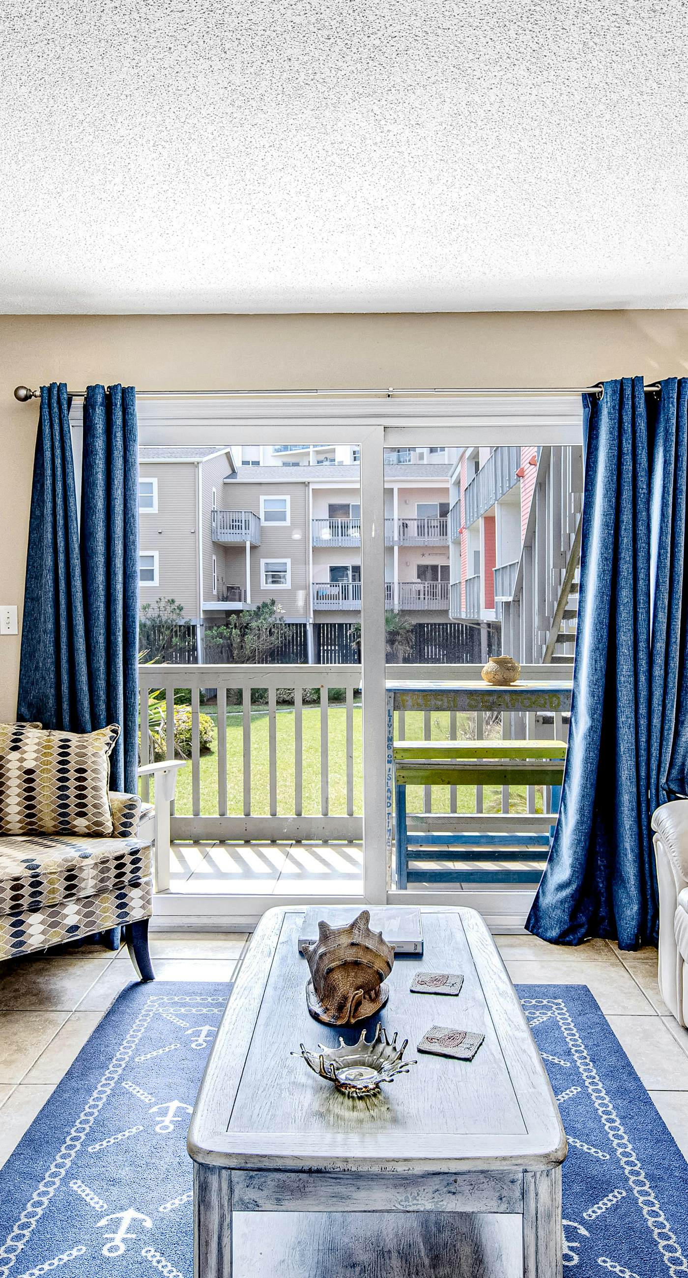 Convenient condo near beach with pool, balcony, & W/D - snowbird-friendly