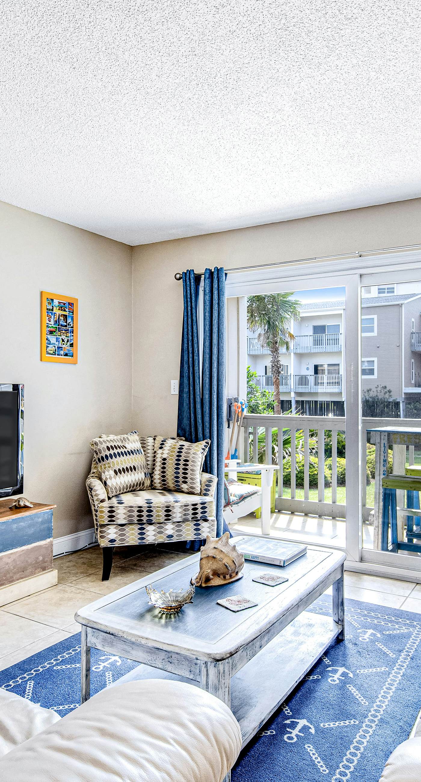 Convenient condo near beach with pool, balcony, & W/D - snowbird-friendly