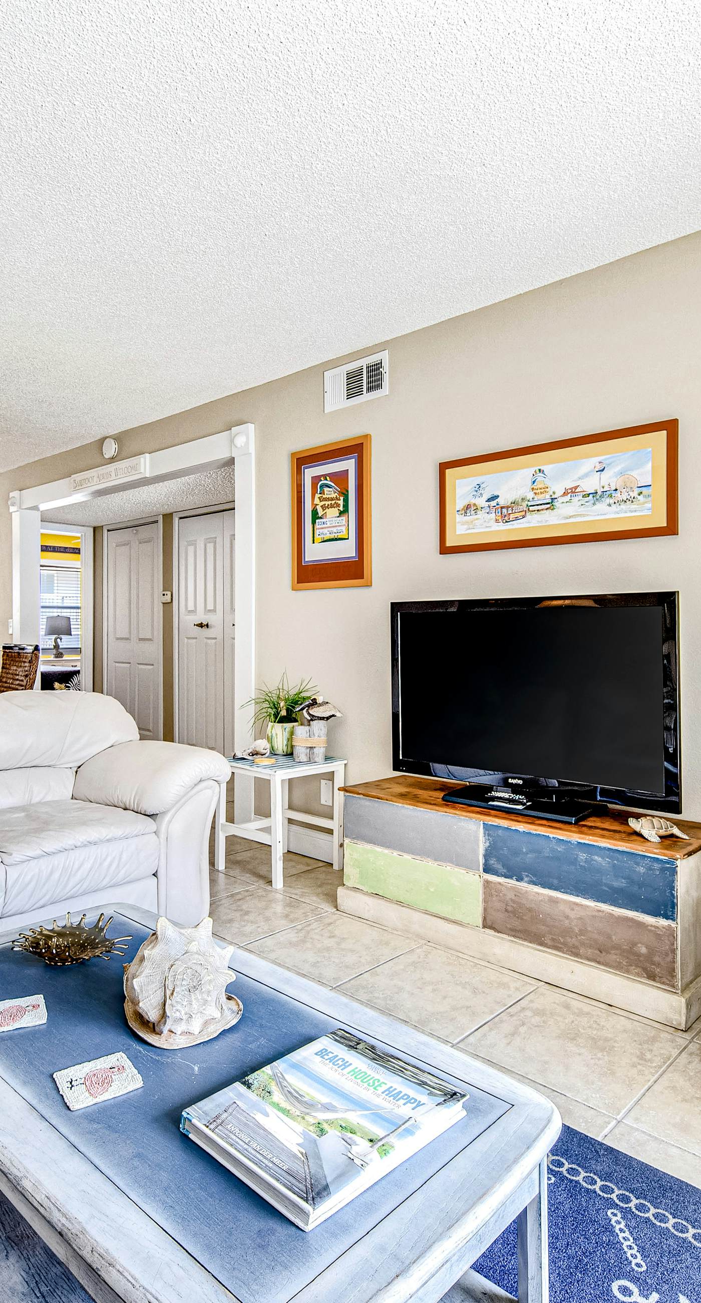 Convenient condo near beach with pool, balcony, & W/D - snowbird-friendly