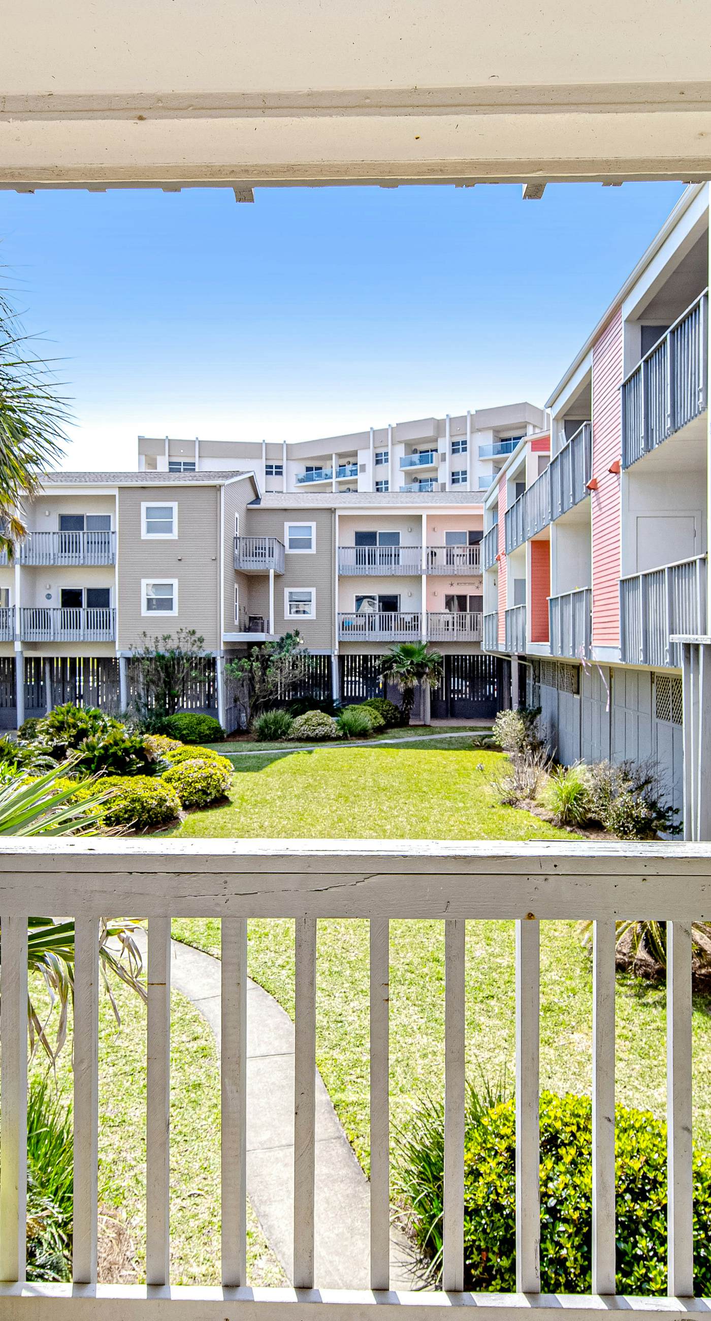 Convenient condo near beach with pool, balcony, & W/D - snowbird-friendly