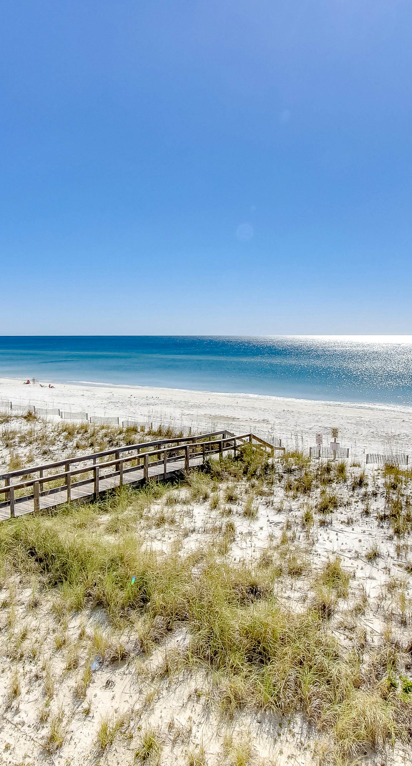 Convenient condo near beach with pool, balcony, & W/D - snowbird-friendly