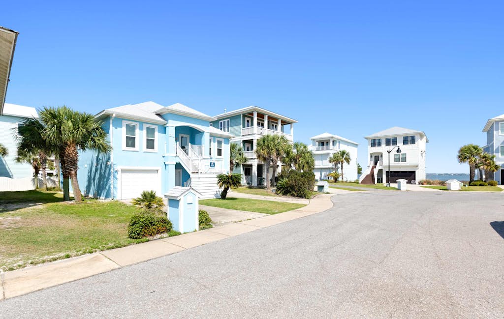Stunning Beach Retreat with Shared Pool, Beach Access, Large Balcony & Gas Grill