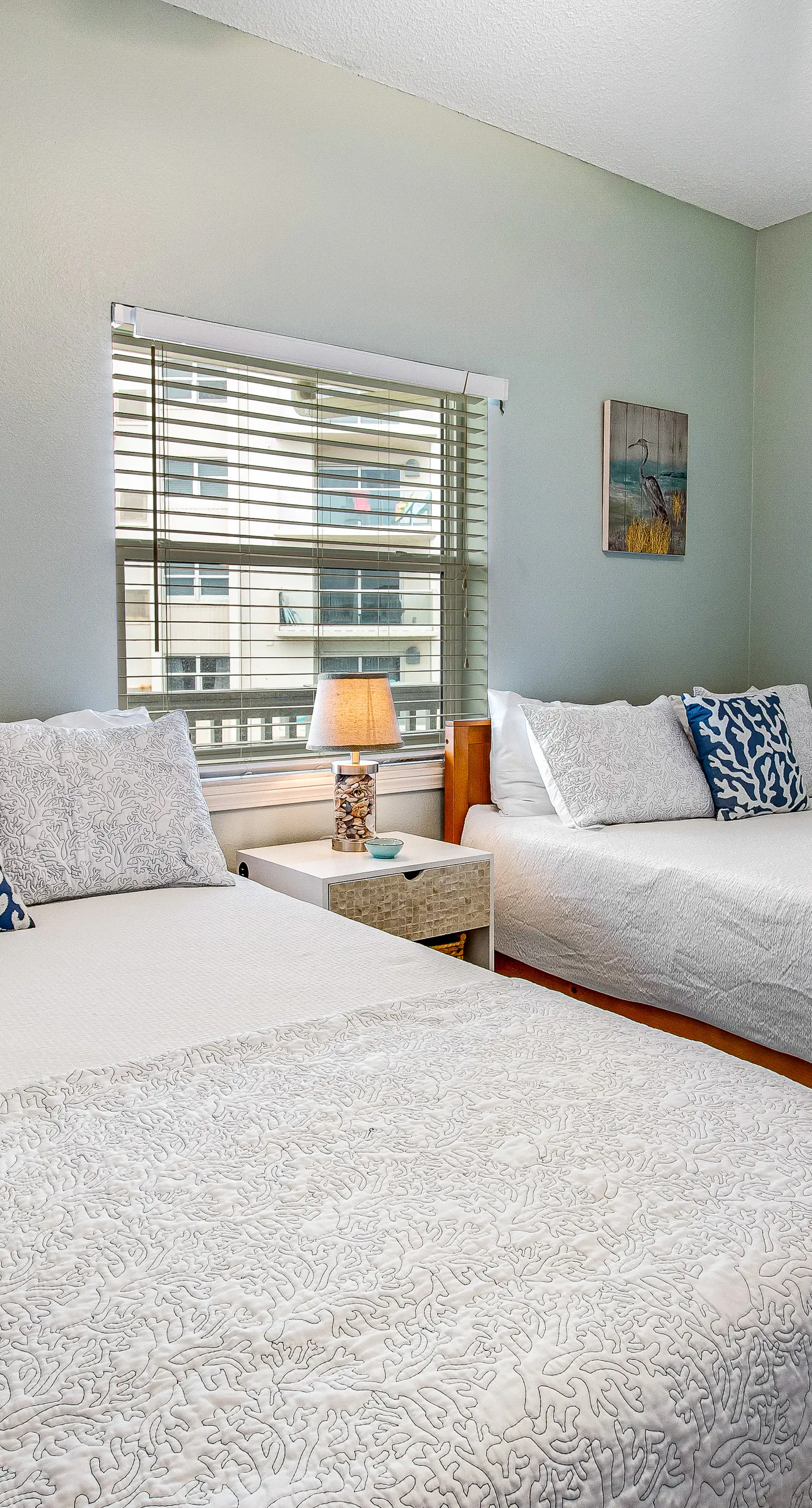 Cozy coastal condo with pool, fast WiFi, central AC, & easy beach access