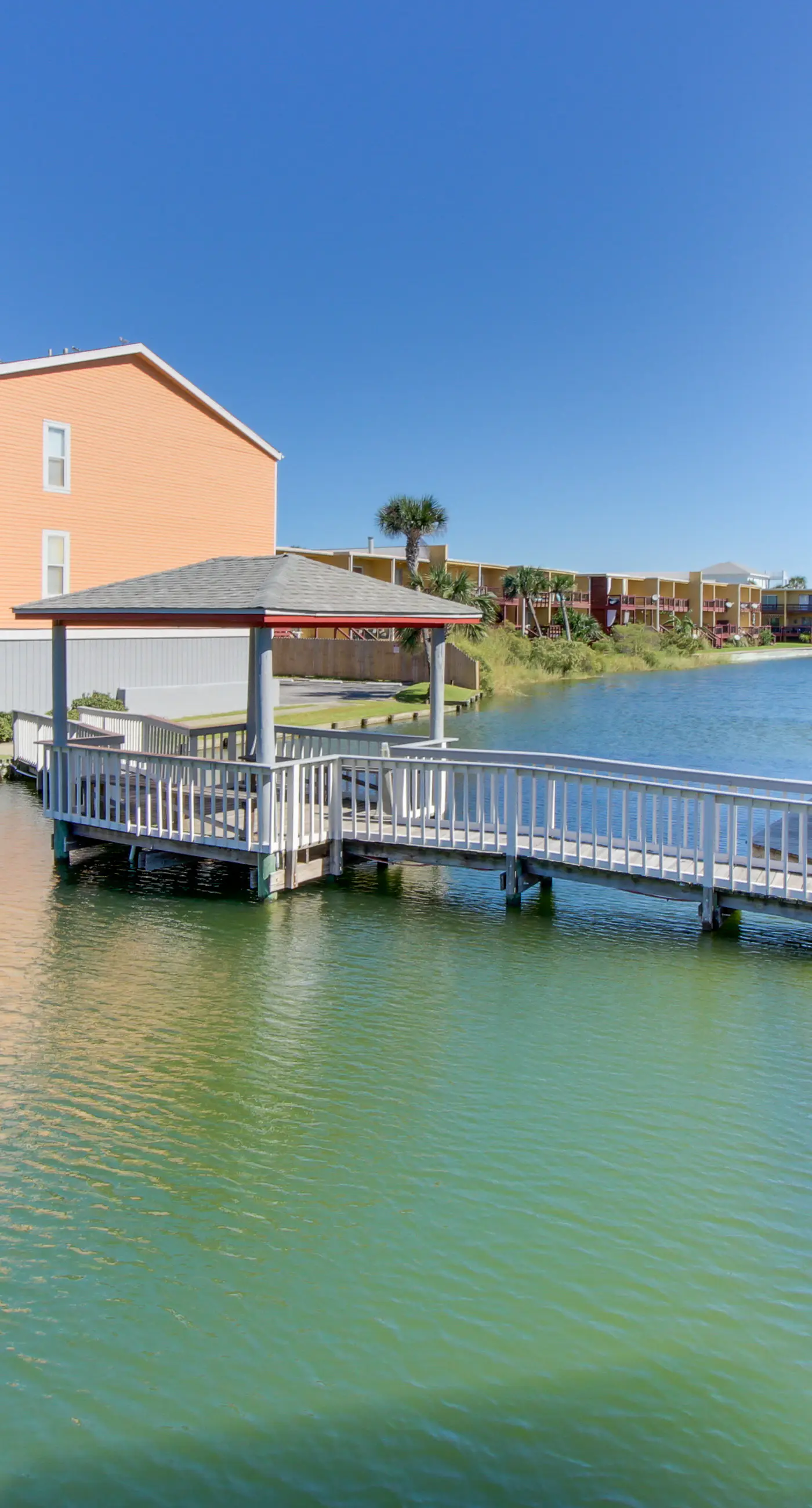 Cozy coastal condo with pool, fast WiFi, central AC, & easy beach access