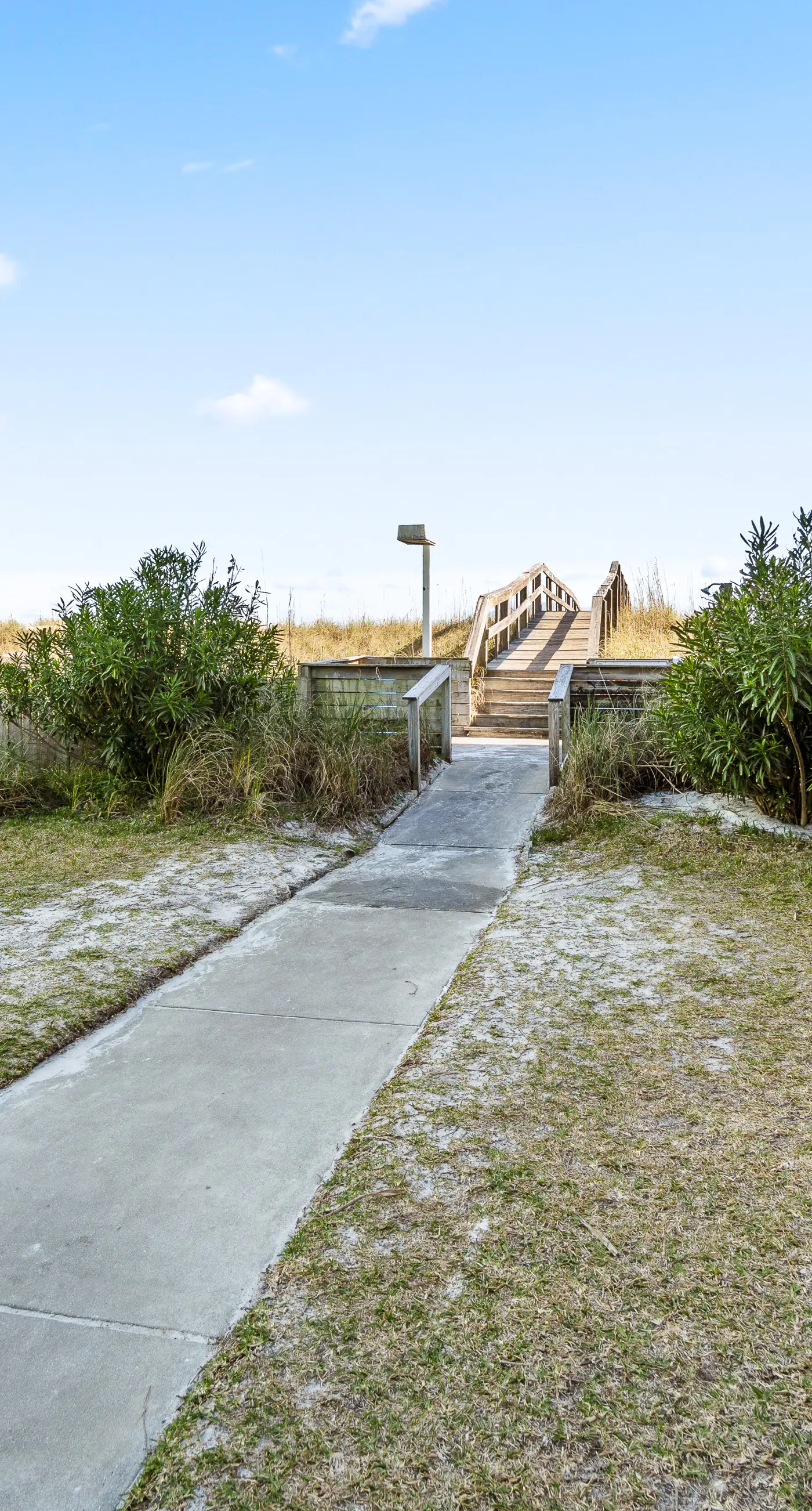 Cozy coastal condo with pool, fast WiFi, central AC, & easy beach access