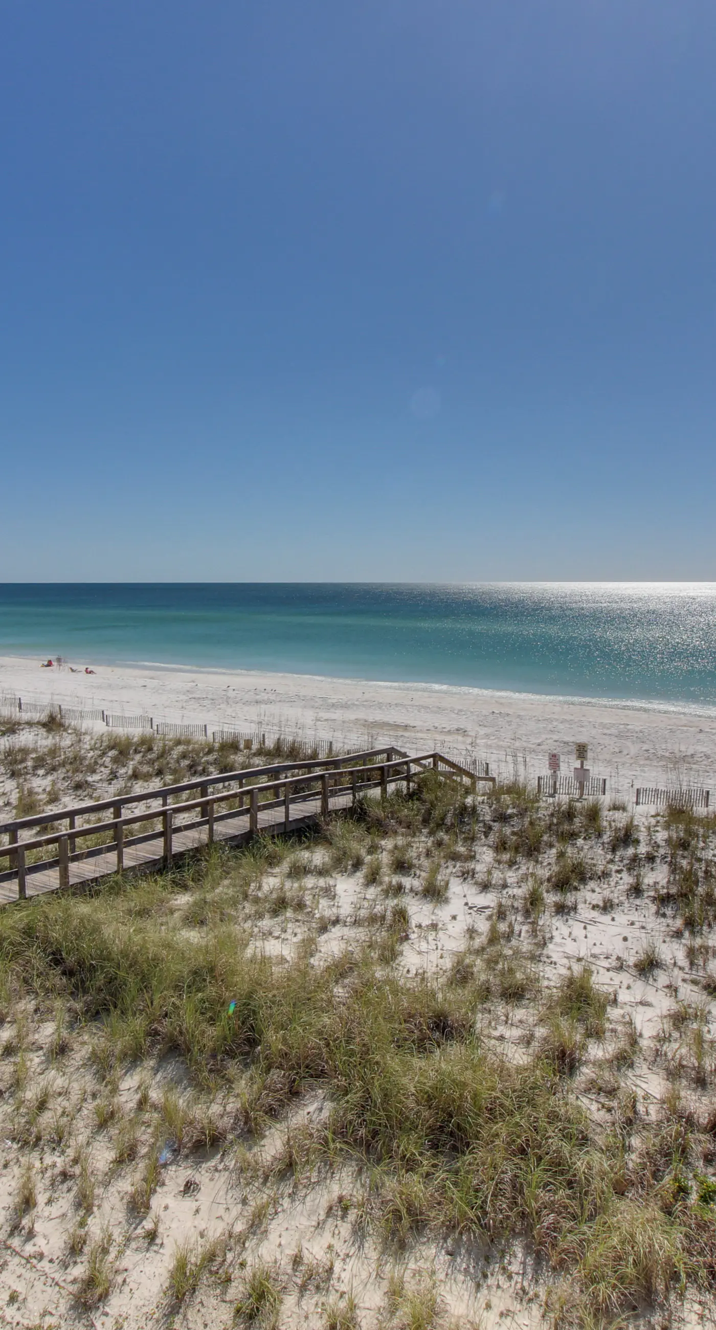 Cozy coastal condo with pool, fast WiFi, central AC, & easy beach access