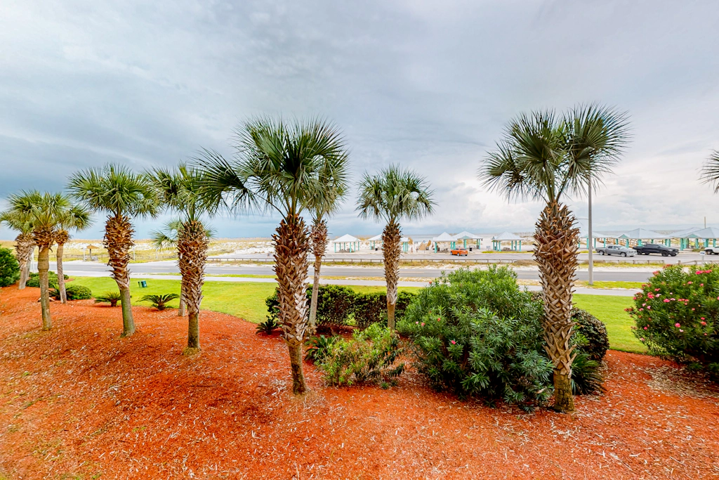 Beachfront condo with pool, Gulf-view balcony, central AC, & washer&dryer