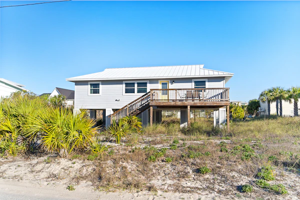 Welcoming stay near the beach with a large deck, washer/dryer, and central AC