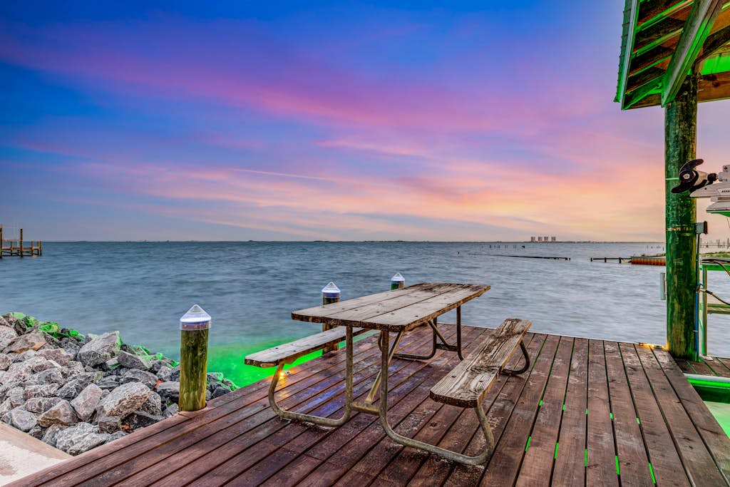 Delightful escape on the sound with beach access, dock, furnished deck, and WiFi