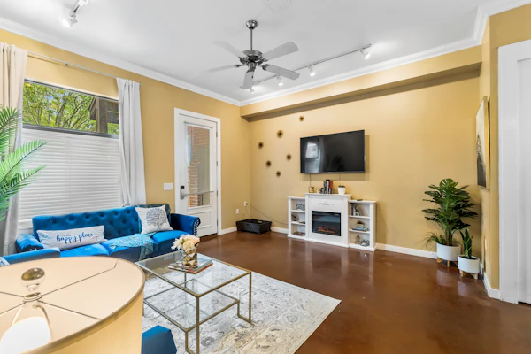 Hip & vibrant townhome near downtown with private patio, grill, AC, and WiFi