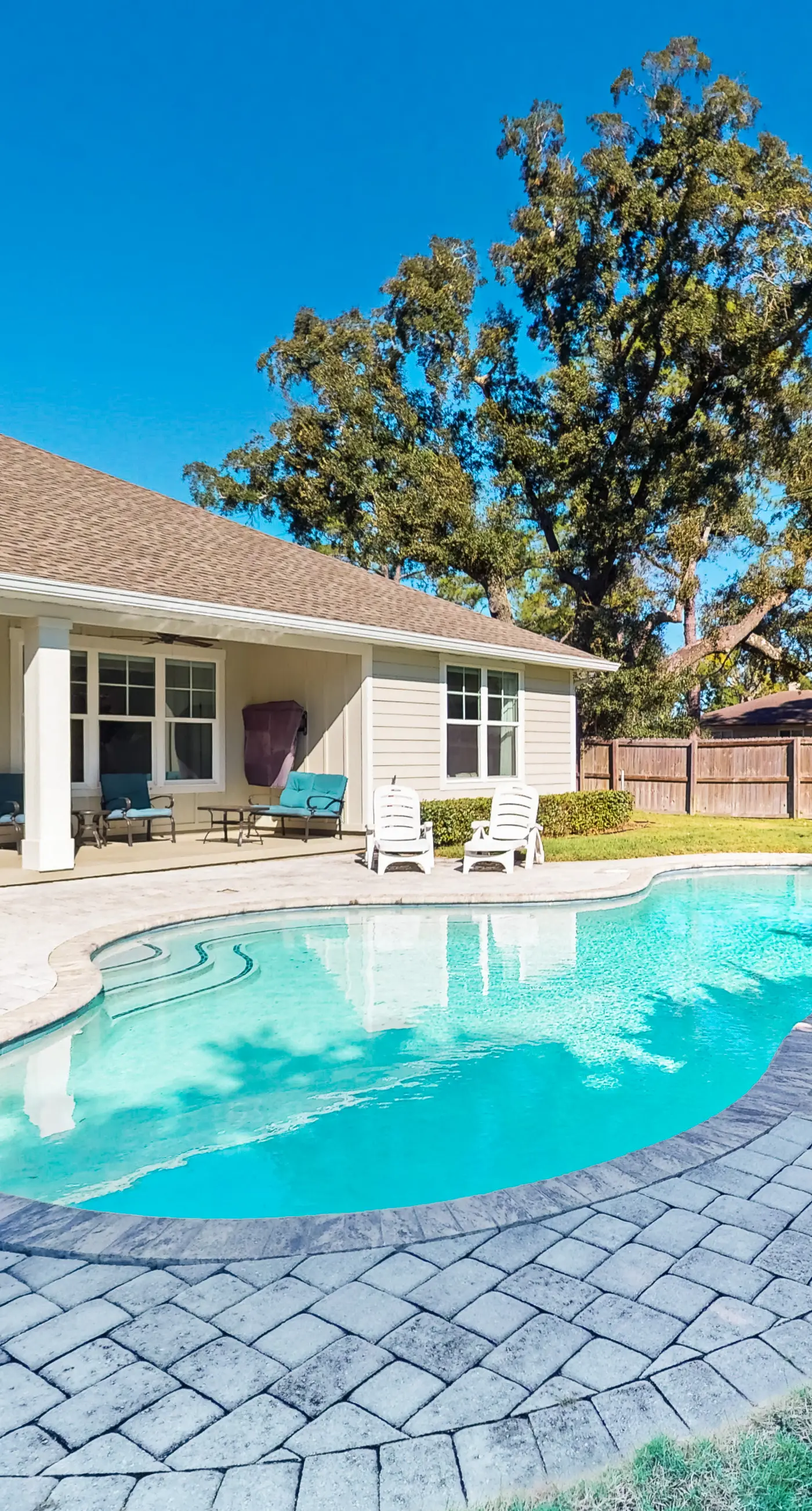 Contemporary dog-friendly retreat with pool & patio - near shops & attractions