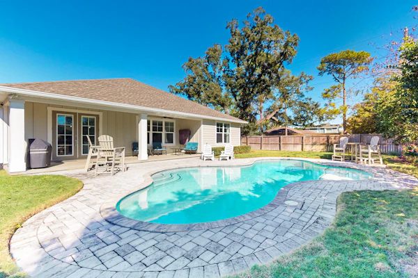 Contemporary dog-friendly retreat with pool & patio - near shops & attractions