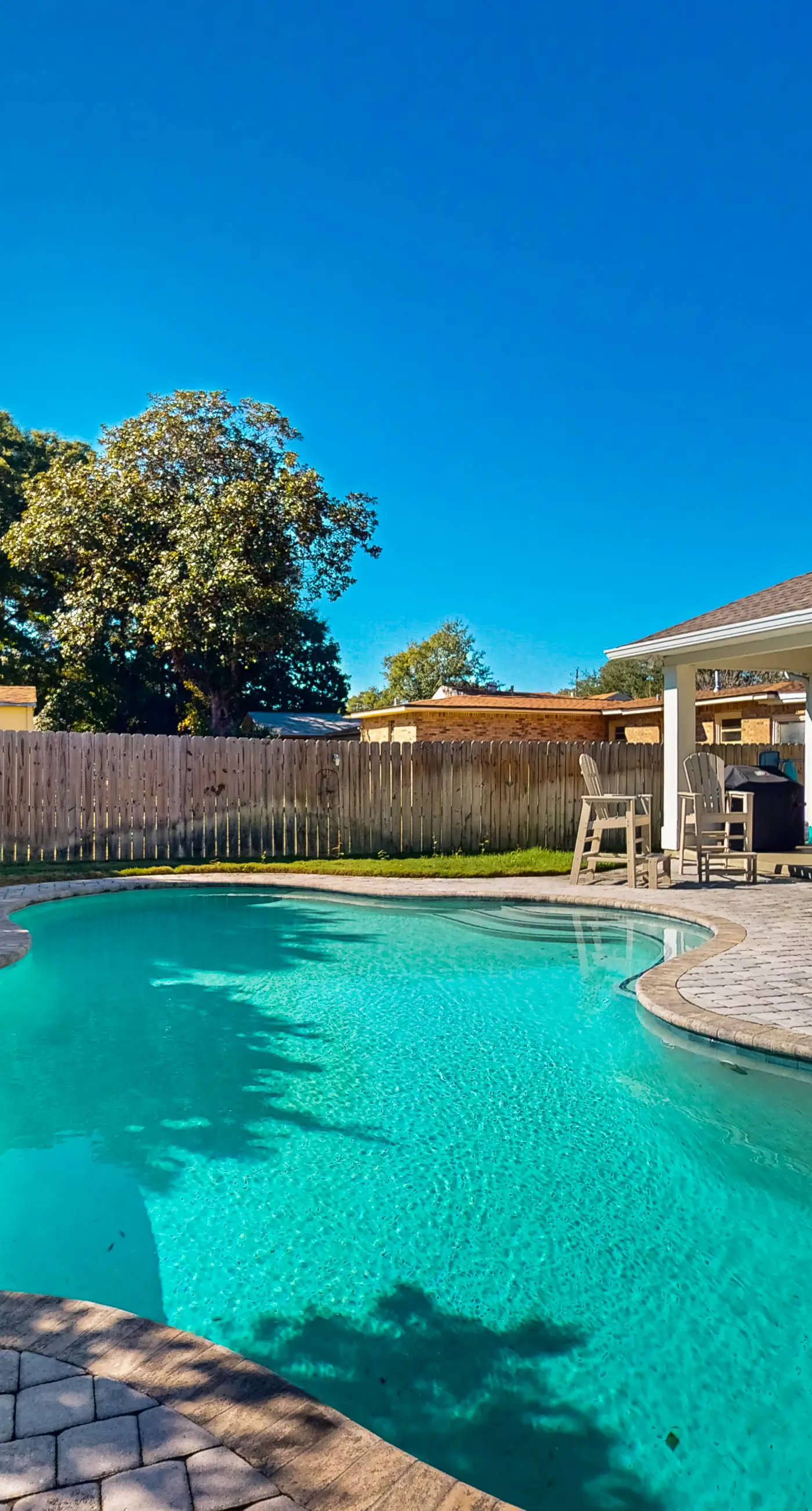 Contemporary dog-friendly retreat with pool & patio - near shops & attractions