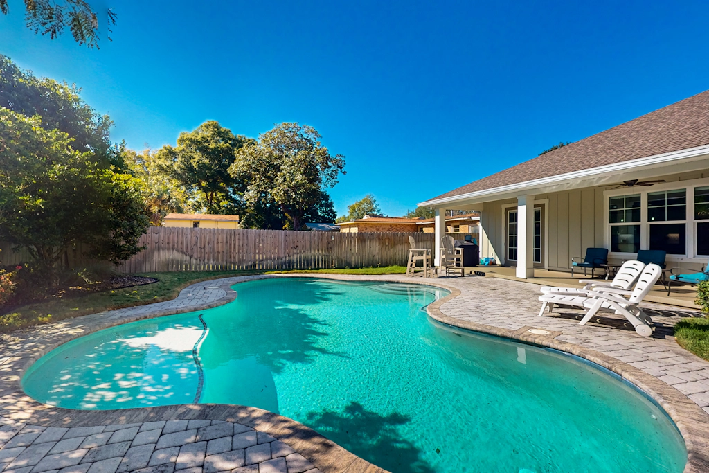 Contemporary dog-friendly retreat with pool & patio - near shops & attractions