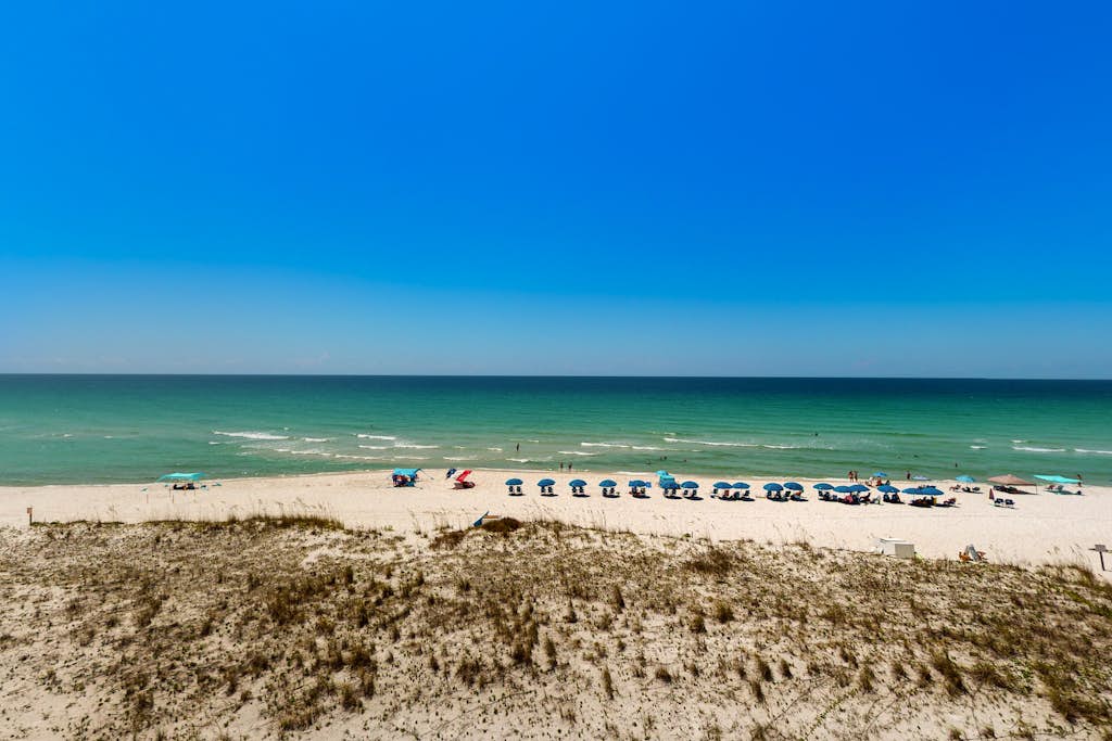 Family-friendly, beachfront condo w/shared outdoor pool, hot tub, & beach access