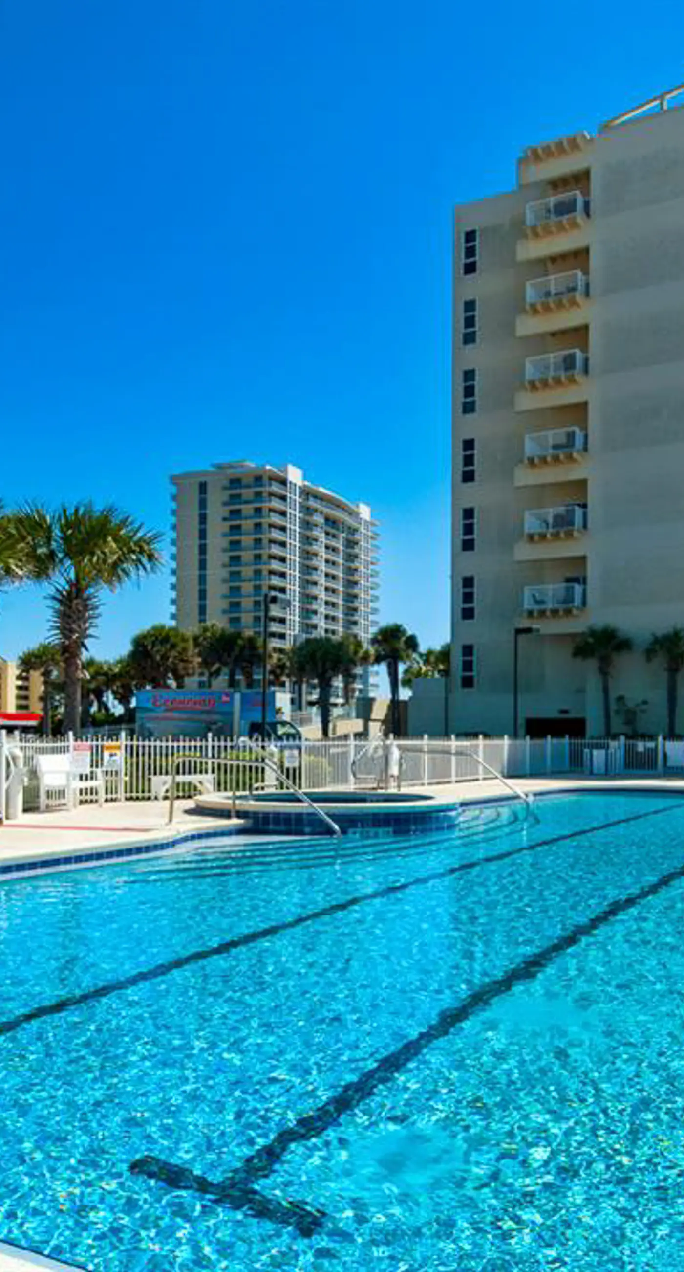 Family-friendly, beachfront condo w/shared outdoor pool, hot tub, & beach access