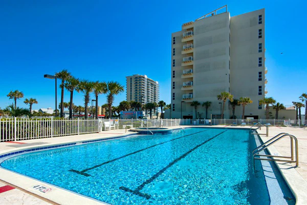 Family-friendly, beachfront condo w/shared outdoor pool, hot tub, & beach access