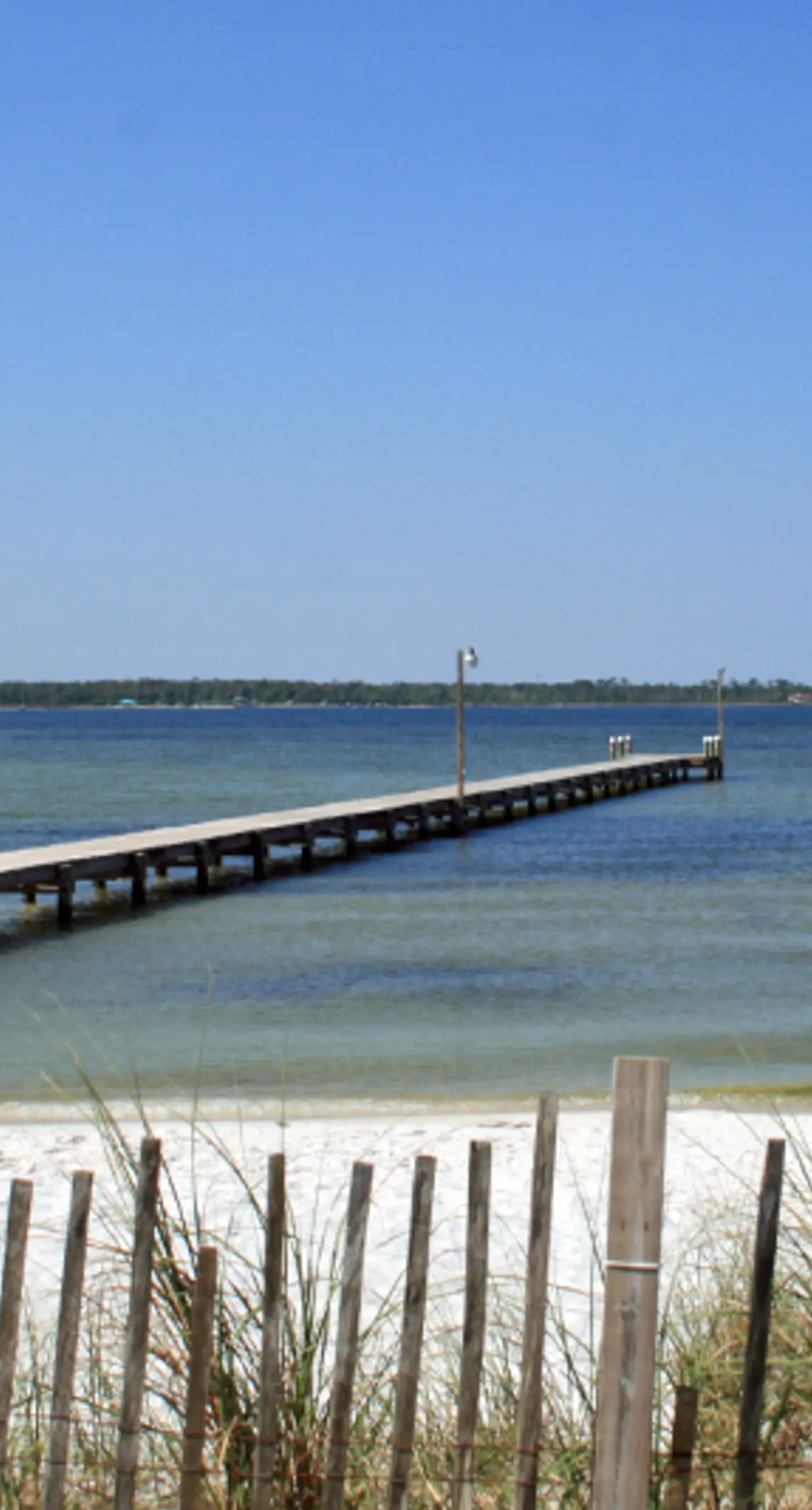 Sound-front home with fishing dock, balcony, sundeck & easy beach access