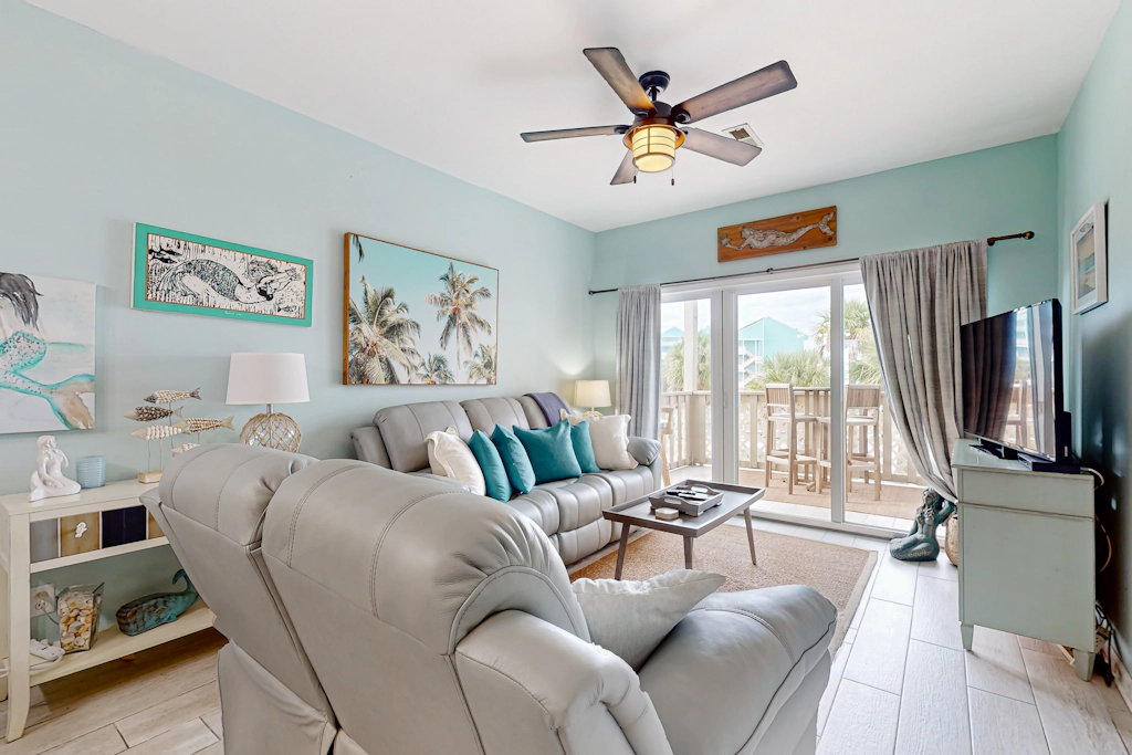 Condo with partial bay view, onsite fishing dock, beach access, & shared pool