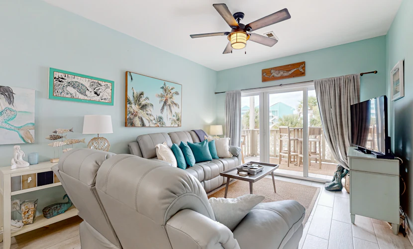 Condo with partial bay view, onsite fishing dock, beach access, & shared pool