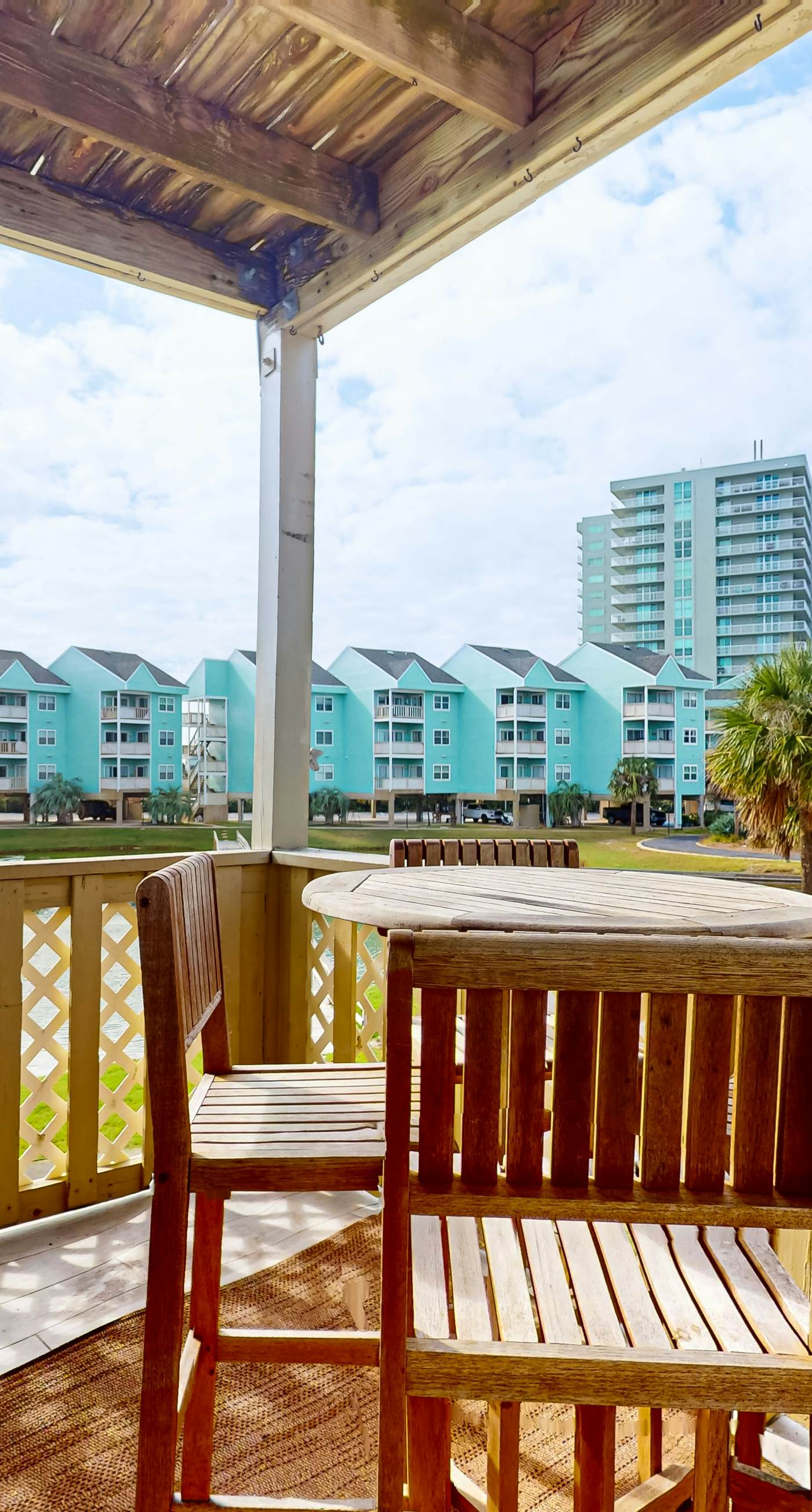 Condo with partial bay view, onsite fishing dock, beach access, & shared pool