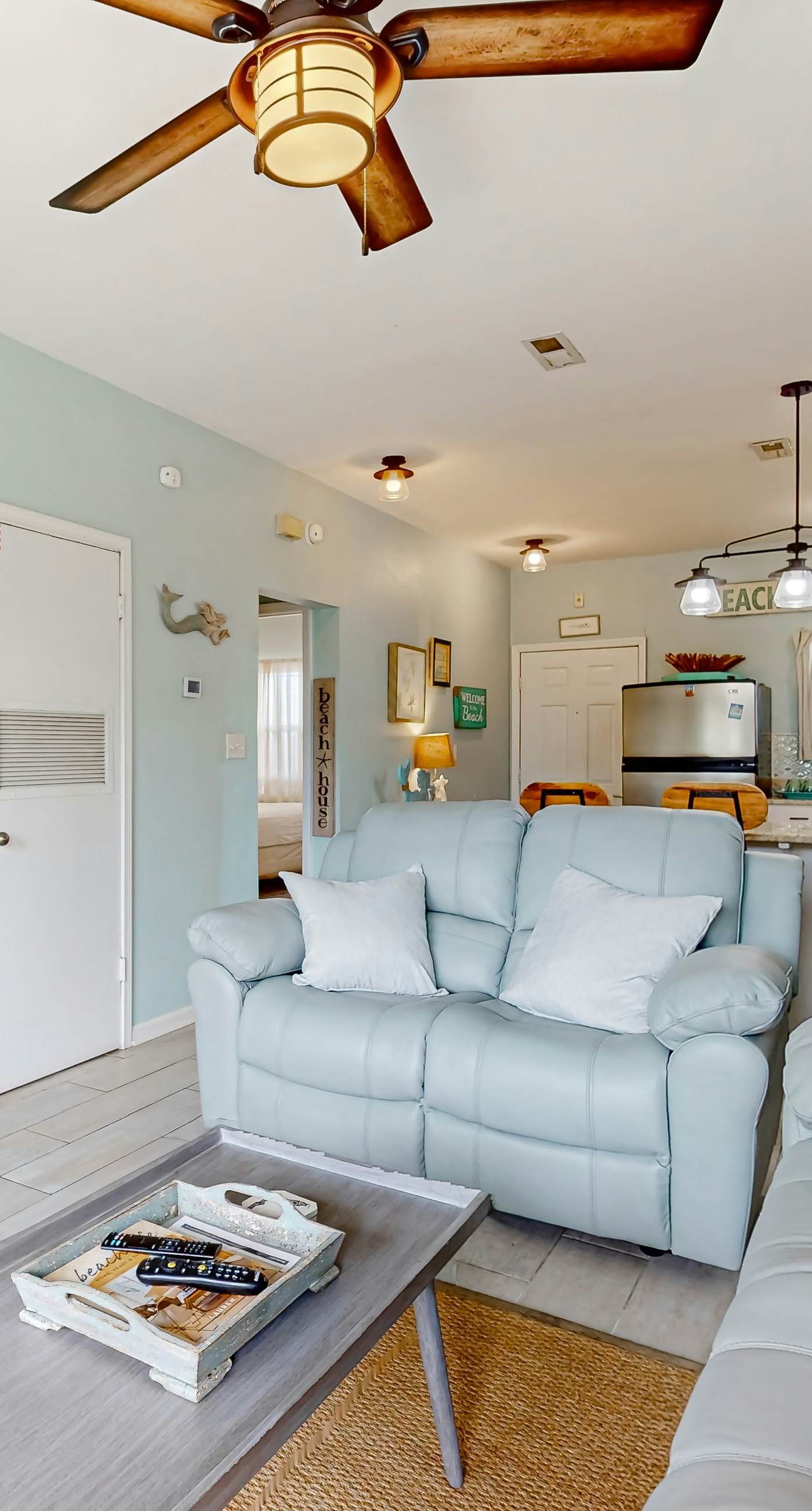 Condo with partial bay view, onsite fishing dock, beach access, & shared pool