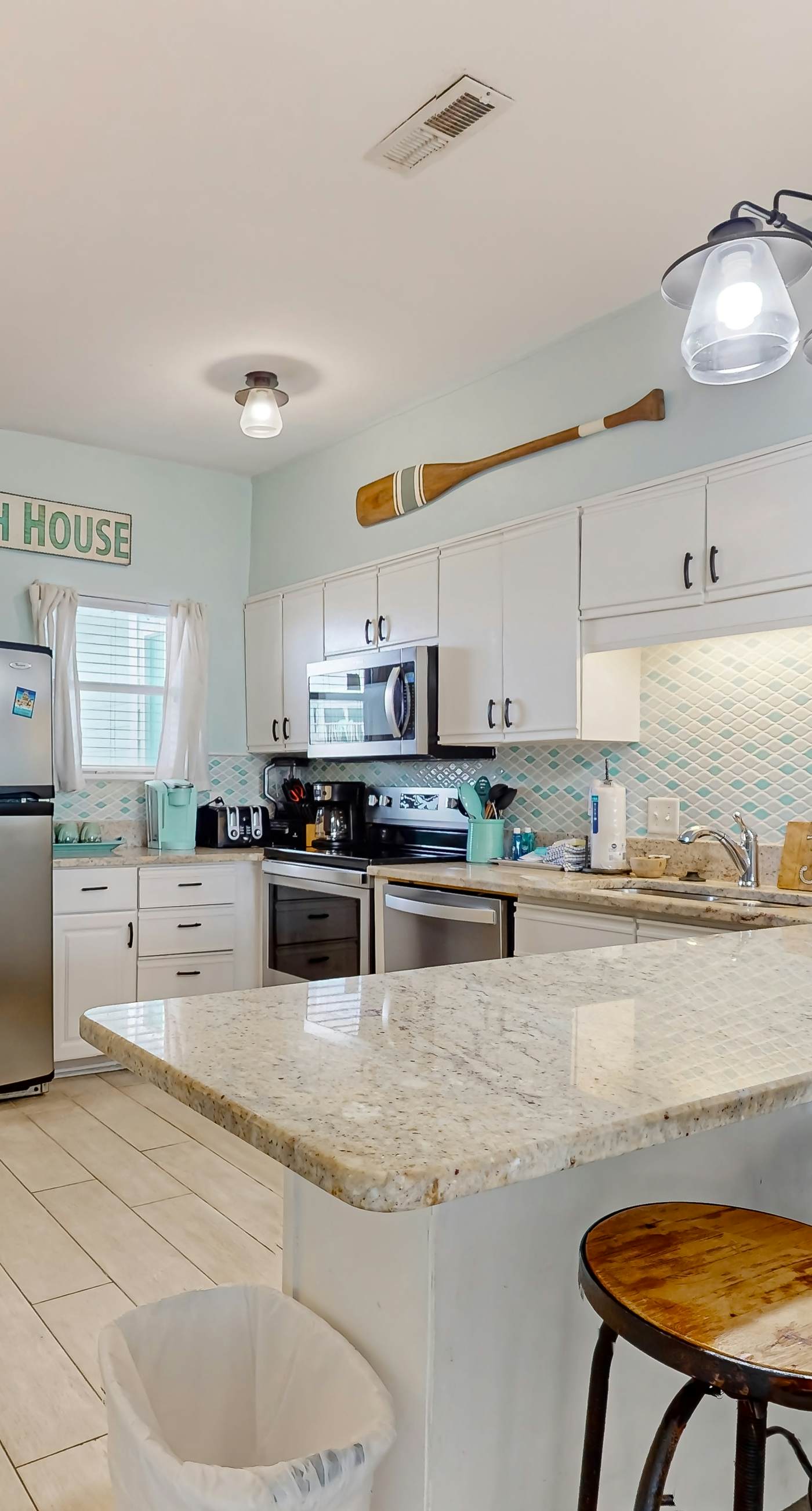 Condo with partial bay view, onsite fishing dock, beach access, & shared pool