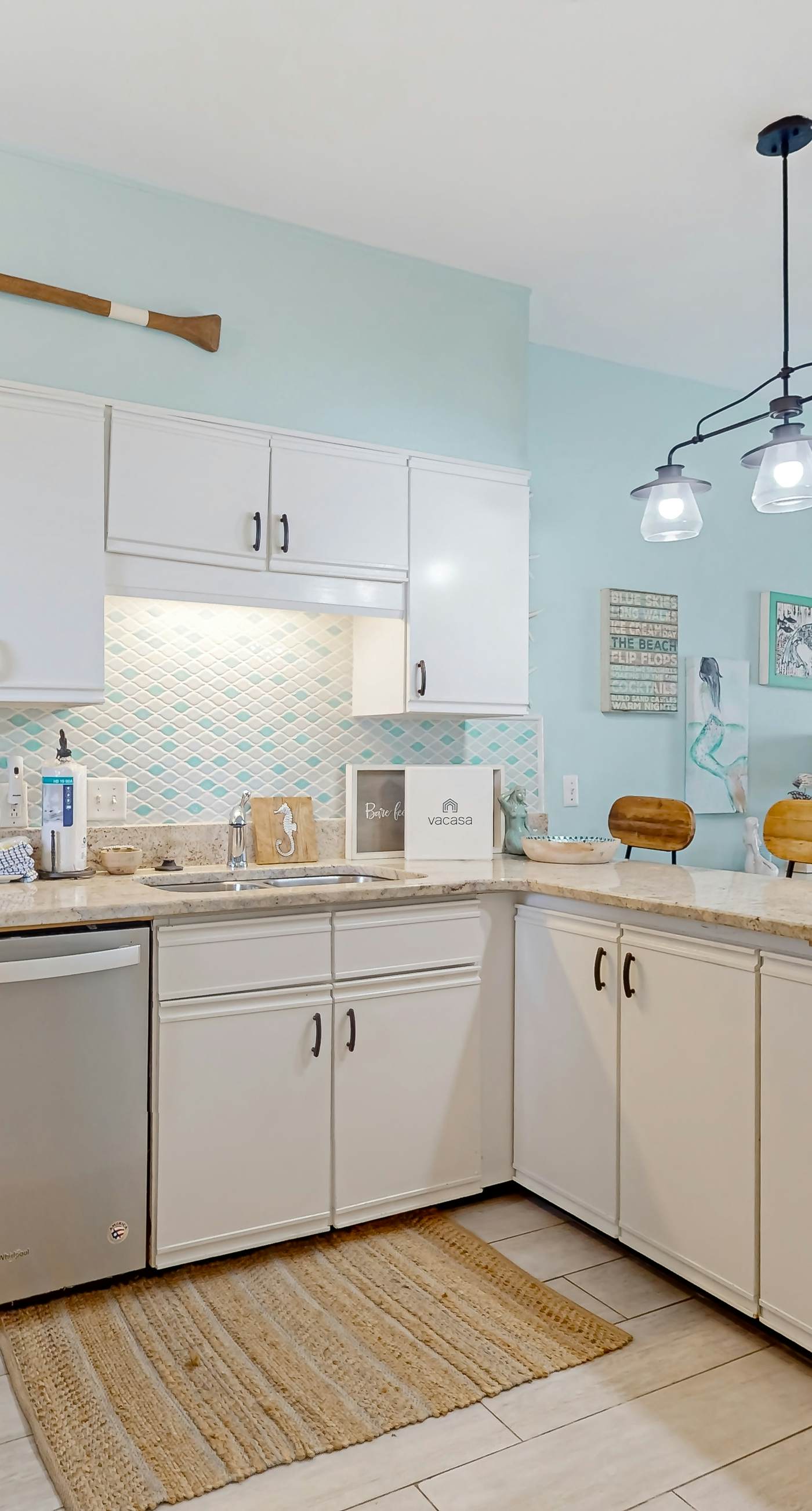 Condo with partial bay view, onsite fishing dock, beach access, & shared pool