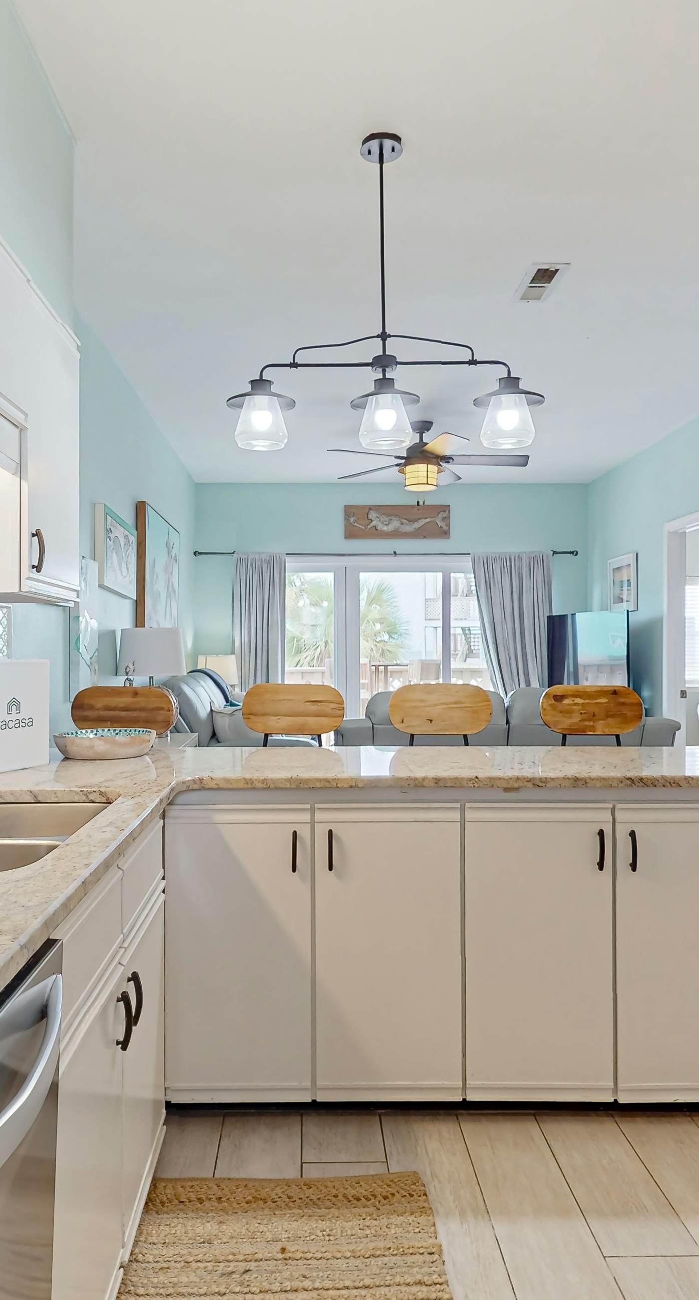 Condo with partial bay view, onsite fishing dock, beach access, & shared pool