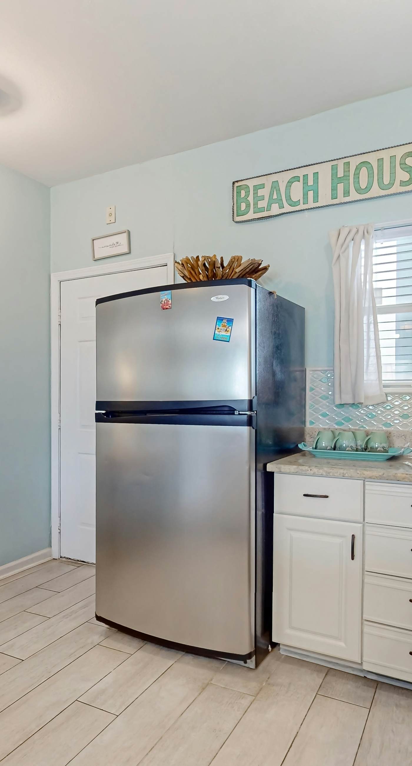 Condo with partial bay view, onsite fishing dock, beach access, & shared pool