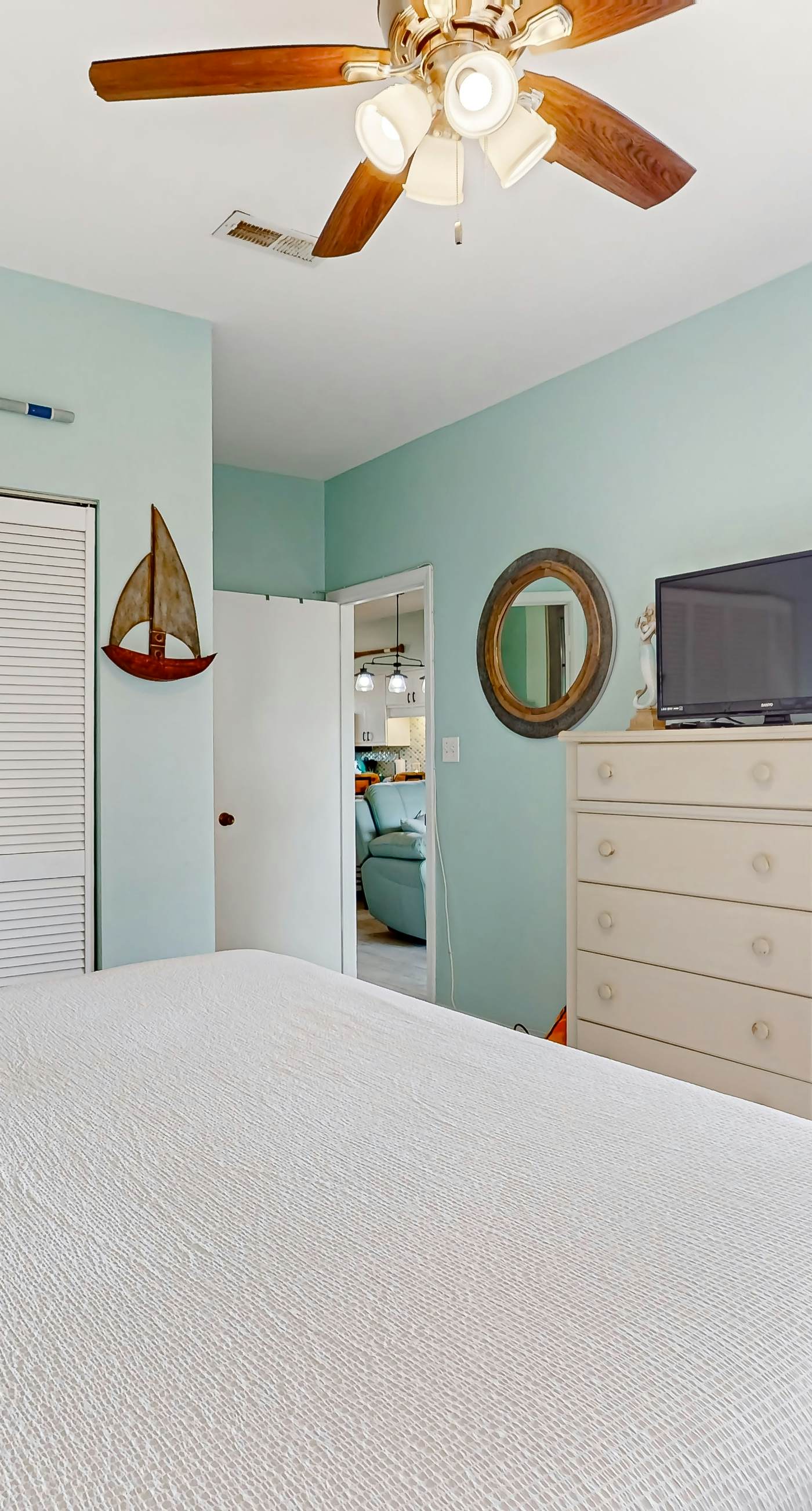 Condo with partial bay view, onsite fishing dock, beach access, & shared pool