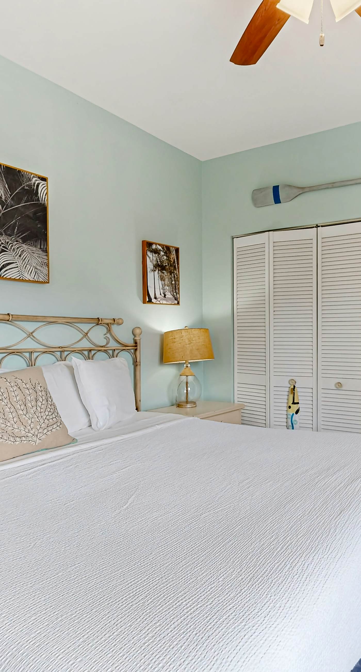 Condo with partial bay view, onsite fishing dock, beach access, & shared pool