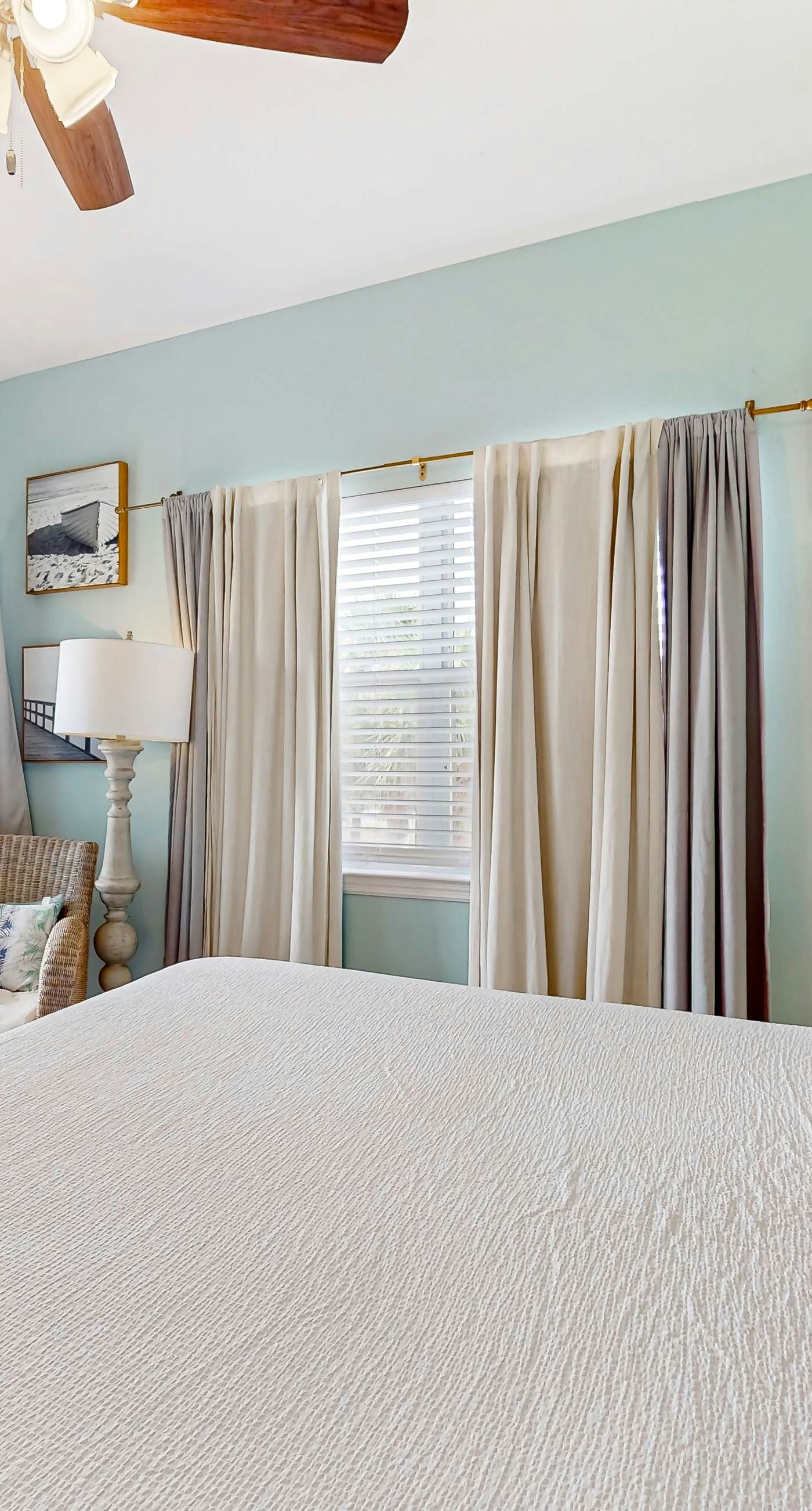 Condo with partial bay view, onsite fishing dock, beach access, & shared pool