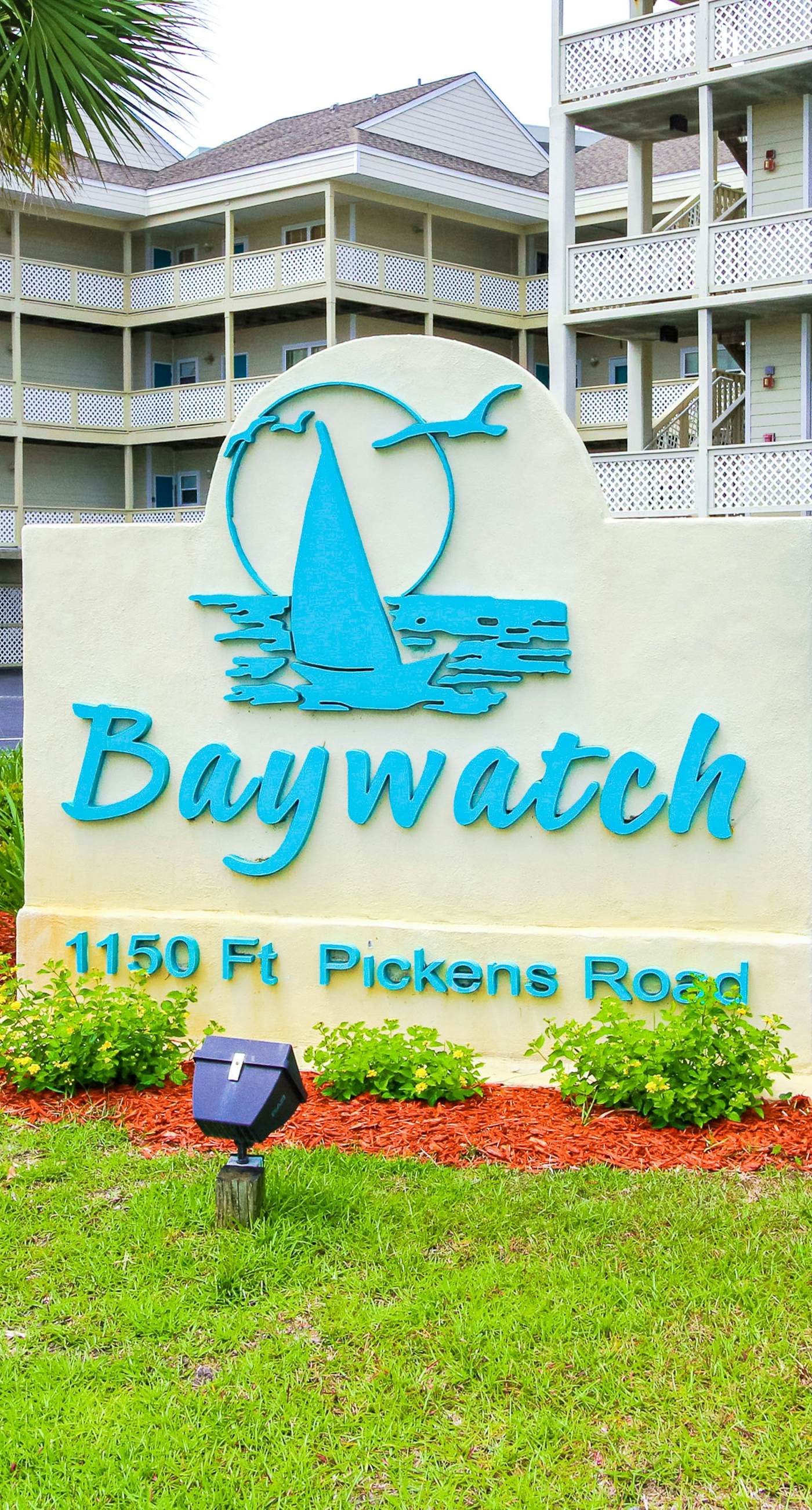 Condo with partial bay view, onsite fishing dock, beach access, & shared pool