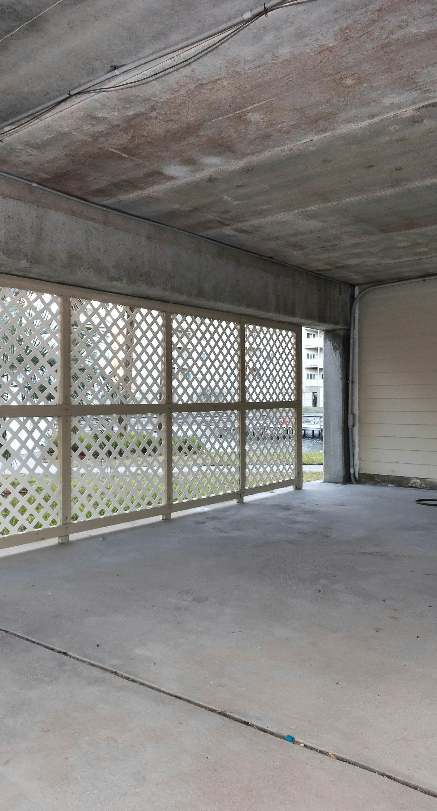 Condo with partial bay view, onsite fishing dock, beach access, & shared pool