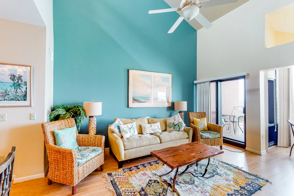 Inviting condo with bay & ocean views, & pool - steps to the beach