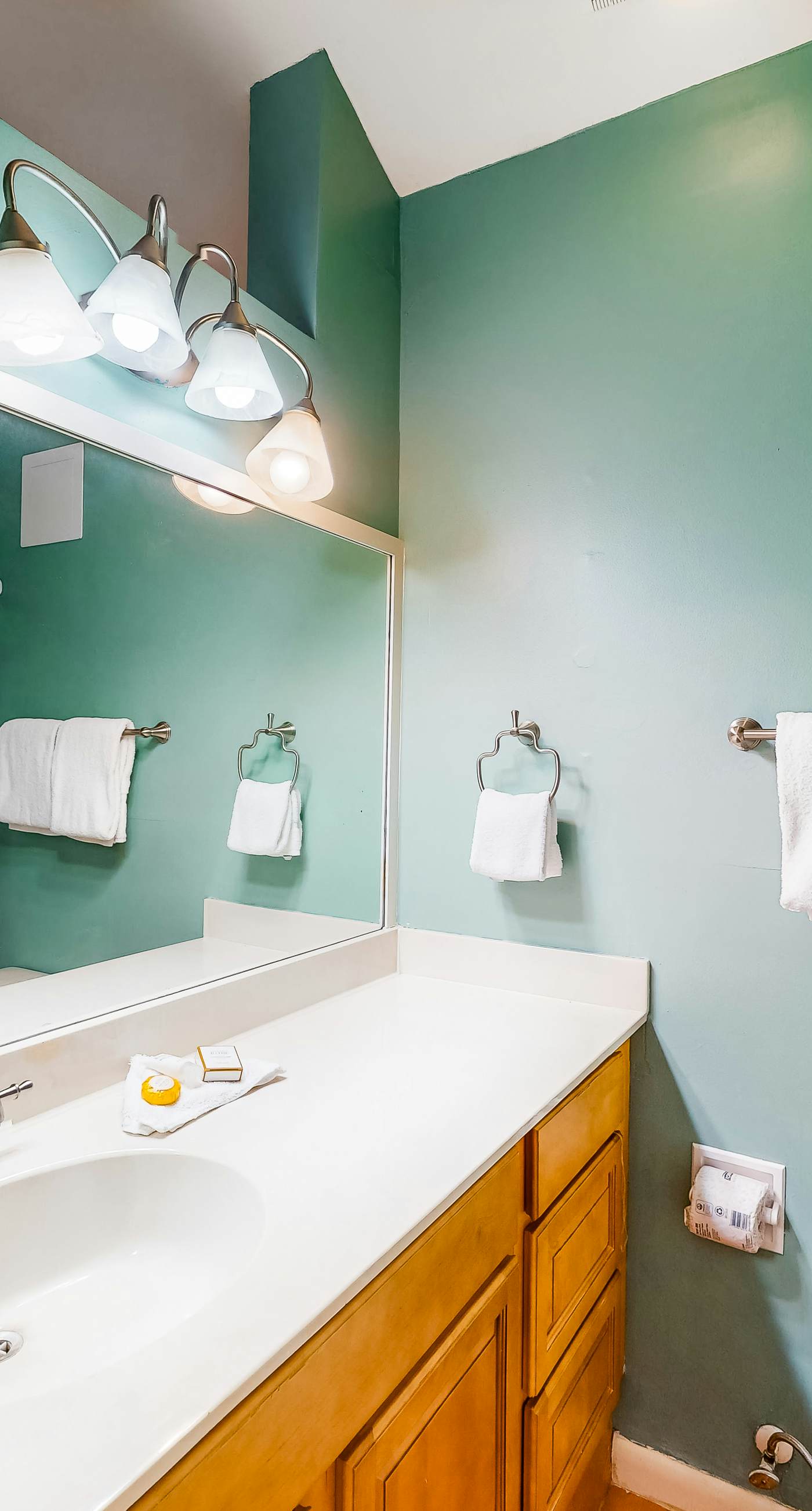 Inviting condo with bay & ocean views, & pool - steps to the beach