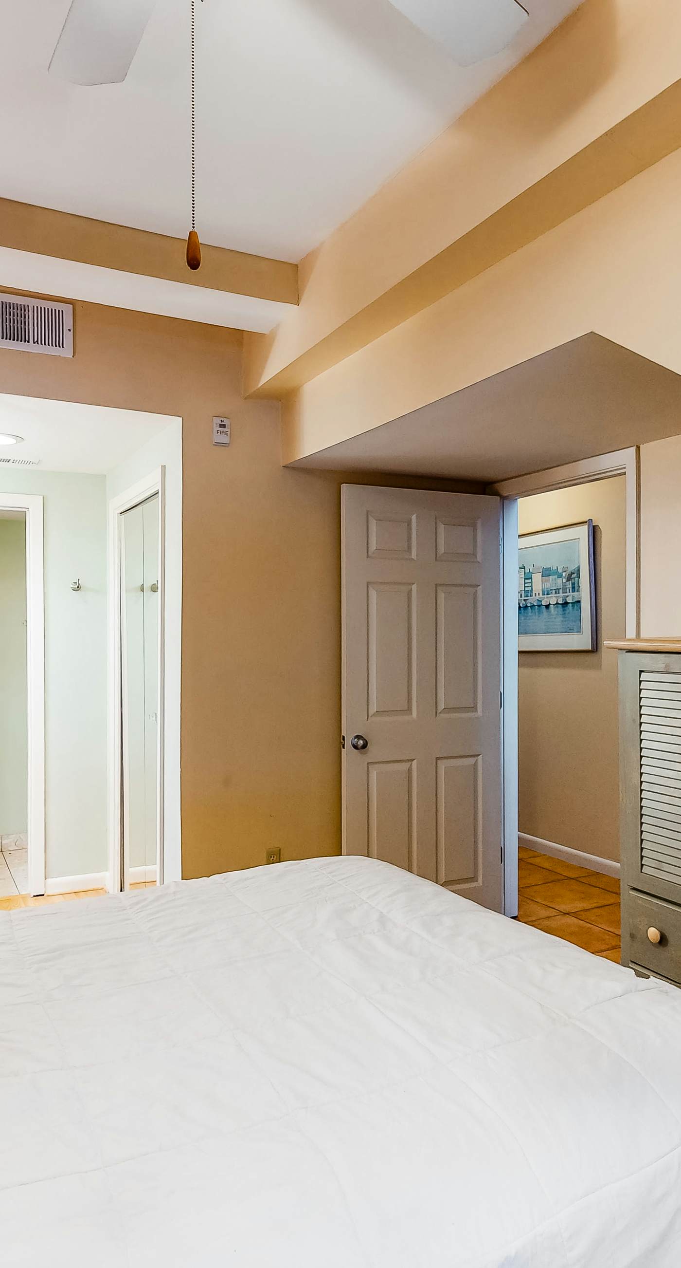 Inviting condo with bay & ocean views, & pool - steps to the beach